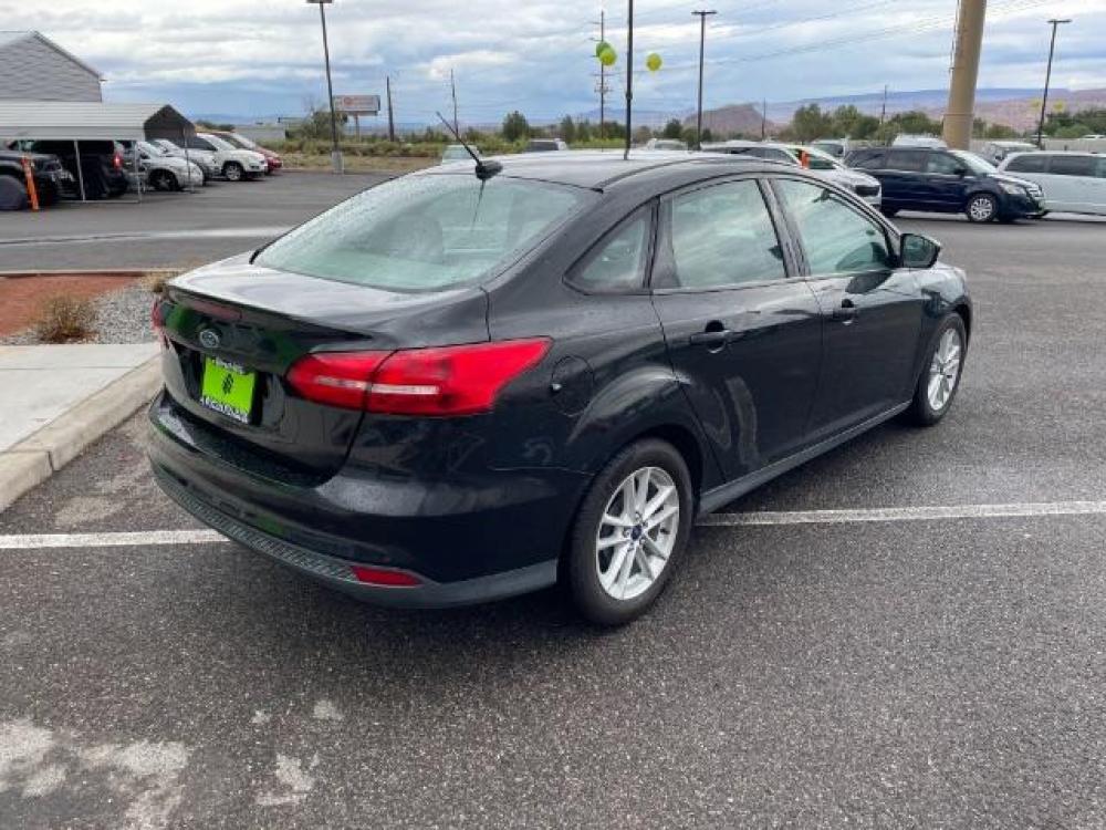 2015 Tuxedo Black Metallic /Charcoal Black Insert w/Warm Steel Surround, cloth Ford Focus SE Sedan (1FADP3F21FL) with an 2.0L L4 DOHC 16V engine, 6-Speed Automatic transmission, located at 1865 East Red Hills Pkwy, St. George, 84770, (435) 628-0023, 37.120850, -113.543640 - We specialize in helping ALL people get the best financing available. No matter your credit score, good, bad or none we can get you an amazing rate. Had a bankruptcy, divorce, or repossessions? We give you the green light to get your credit back on the road. Low down and affordable payments that fit - Photo #8