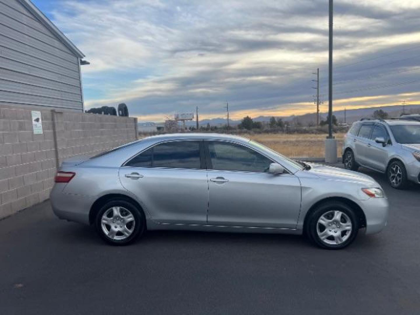2007 Titanium Metallic /Bisque Cloth Interio Toyota Camry LE V6 (4T1BK46KX7U) with an 3.5L V6 DOHC 24V engine, 6-Speed Automatic transmission, located at 1865 East Red Hills Pkwy, St. George, 84770, (435) 628-0023, 37.120850, -113.543640 - This vehicle is a Mechanic Special. This means it will need some love. Runs a drives fine but has body damage, leaks or other mechanical issues. It did NOT pass our 50 point inspection. Get a great deal on a less than perfect car. These cars do NOT qualify for our in house financing. Cash and carry, - Photo#7