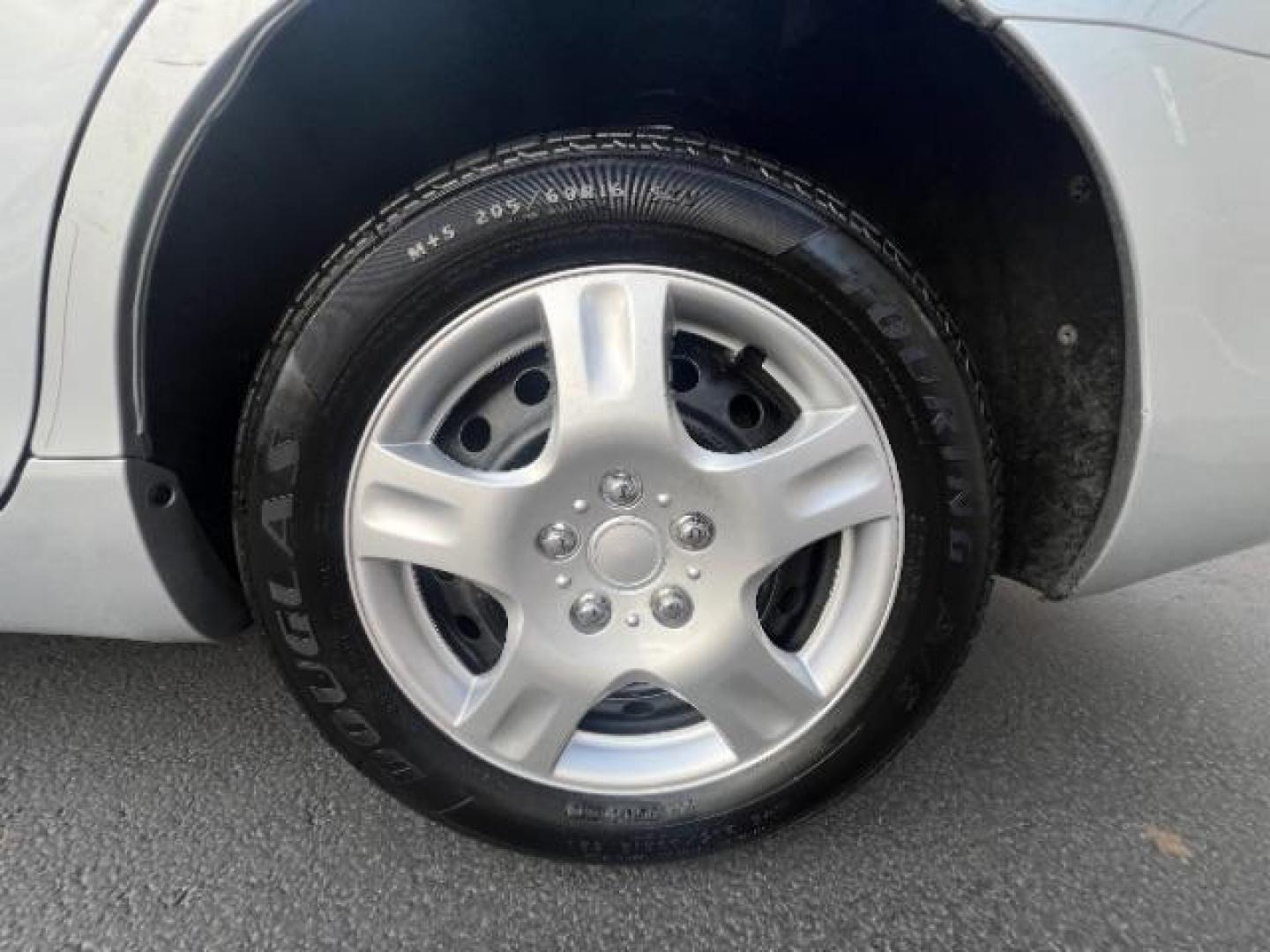 2007 Titanium Metallic /Bisque Cloth Interio Toyota Camry LE V6 (4T1BK46KX7U) with an 3.5L V6 DOHC 24V engine, 6-Speed Automatic transmission, located at 1865 East Red Hills Pkwy, St. George, 84770, (435) 628-0023, 37.120850, -113.543640 - This vehicle is a Mechanic Special. This means it will need some love. Runs a drives fine but has body damage, leaks or other mechanical issues. It did NOT pass our 50 point inspection. Get a great deal on a less than perfect car. These cars do NOT qualify for our in house financing. Cash and carry, - Photo#8