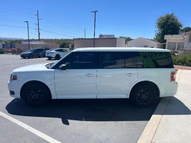 2014 White Suede /Charcoal Black Ford Flex SE FWD (2FMGK5B87EB) with an 3.5L V6 DOHC 24V engine, 6-Speed Automatic Overdrive transmission, located at 1865 East Red Hills Pkwy, St. George, 84770, (435) 628-0023, 37.120850, -113.543640 - Need three-row space without a huge truck payment? This White Suede 2014 Ford Flex SE FWD brings a 3.5L V6, 6-speed automatic, and front-wheel drive - the practical Flex layout families still love around Southern Utah. We specialize in in-house financing and work with all credit types - good, fair,- Photo#3