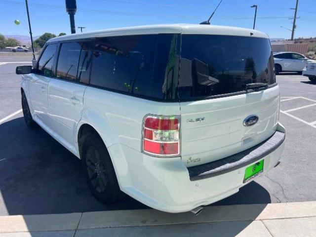 2014 White Suede /Charcoal Black Ford Flex SE FWD (2FMGK5B87EB) with an 3.5L V6 DOHC 24V engine, 6-Speed Automatic Overdrive transmission, located at 1865 East Red Hills Pkwy, St. George, 84770, (435) 628-0023, 37.120850, -113.543640 - Need three-row space without a huge truck payment? This White Suede 2014 Ford Flex SE FWD brings a 3.5L V6, 6-speed automatic, and front-wheel drive - the practical Flex layout families still love around Southern Utah. We specialize in in-house financing and work with all credit types - good, fair,- Photo#4
