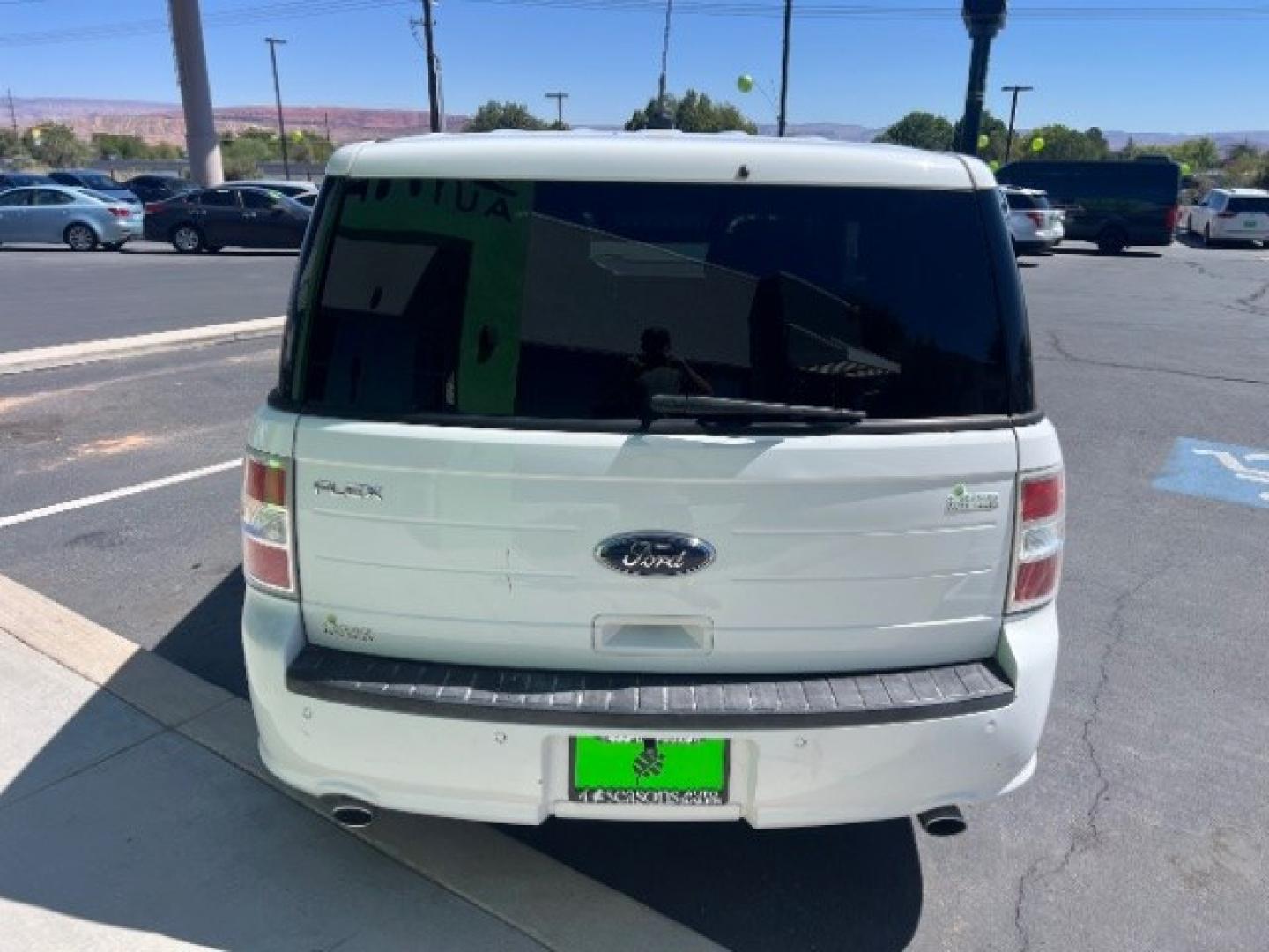 2014 White Suede /Charcoal Black Ford Flex SE FWD (2FMGK5B87EB) with an 3.5L V6 DOHC 24V engine, 6-Speed Automatic Overdrive transmission, located at 1865 East Red Hills Pkwy, St. George, 84770, (435) 628-0023, 37.120850, -113.543640 - Versatile Southern Utah travel starts with this 2014 Ford Flex SE FWD. Its 3.5L V6 engine, 6-speed automatic transmission, and front-wheel drive make it a smart fit for family trips, commuting, and three-row travel. With 147700 miles, this Flex is ready for its next adventure. The SE adds three-row- Photo#5