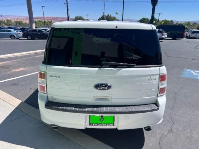 2014 White Suede /Charcoal Black Ford Flex SE FWD (2FMGK5B87EB) with an 3.5L V6 DOHC 24V engine, 6-Speed Automatic Overdrive transmission, located at 1865 East Red Hills Pkwy, St. George, 84770, (435) 628-0023, 37.120850, -113.543640 - Need three-row space without a huge truck payment? This White Suede 2014 Ford Flex SE FWD brings a 3.5L V6, 6-speed automatic, and front-wheel drive - the practical Flex layout families still love around Southern Utah. We specialize in in-house financing and work with all credit types - good, fair,- Photo#5