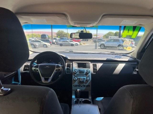 2014 White Suede /Charcoal Black Ford Flex SE FWD (2FMGK5B87EB) with an 3.5L V6 DOHC 24V engine, 6-Speed Automatic Overdrive transmission, located at 1865 East Red Hills Pkwy, St. George, 84770, (435) 628-0023, 37.120850, -113.543640 - Need three-row space without a huge truck payment? This White Suede 2014 Ford Flex SE FWD brings a 3.5L V6, 6-speed automatic, and front-wheel drive - the practical Flex layout families still love around Southern Utah. We specialize in in-house financing and work with all credit types - good, fair,- Photo#22