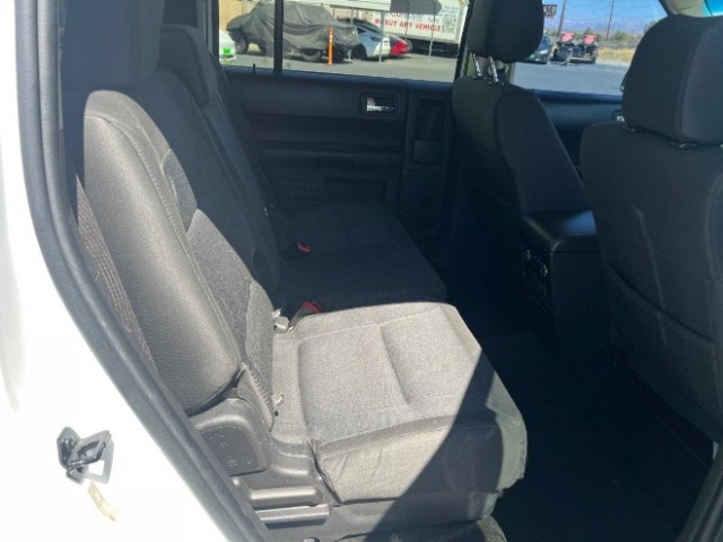 2014 White Suede /Charcoal Black Ford Flex SE FWD (2FMGK5B87EB) with an 3.5L V6 DOHC 24V engine, 6-Speed Automatic Overdrive transmission, located at 1865 East Red Hills Pkwy, St. George, 84770, (435) 628-0023, 37.120850, -113.543640 - Versatile Southern Utah travel starts with this 2014 Ford Flex SE FWD. Its 3.5L V6 engine, 6-speed automatic transmission, and front-wheel drive make it a smart fit for family trips, commuting, and three-row travel. With 147700 miles, this Flex is ready for its next adventure. The SE adds three-row- Photo#28