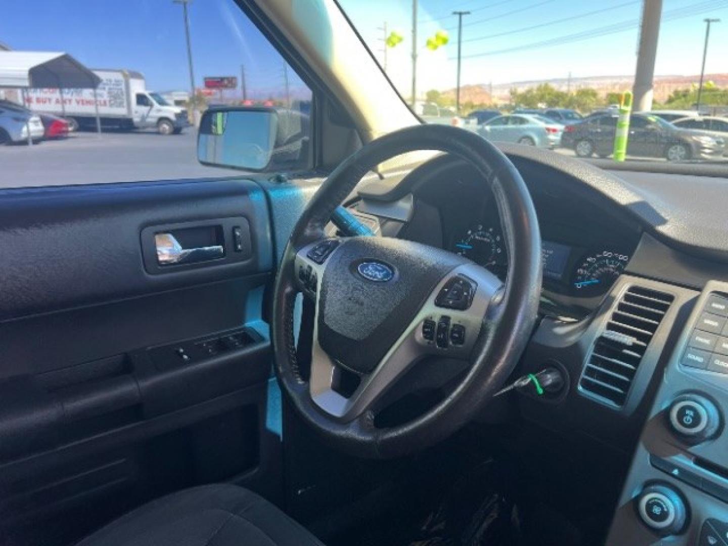 2014 White Suede /Charcoal Black Ford Flex SE FWD (2FMGK5B87EB) with an 3.5L V6 DOHC 24V engine, 6-Speed Automatic Overdrive transmission, located at 1865 East Red Hills Pkwy, St. George, 84770, (435) 628-0023, 37.120850, -113.543640 - Versatile Southern Utah travel starts with this 2014 Ford Flex SE FWD. Its 3.5L V6 engine, 6-speed automatic transmission, and front-wheel drive make it a smart fit for family trips, commuting, and three-row travel. With 147700 miles, this Flex is ready for its next adventure. The SE adds three-row- Photo#32