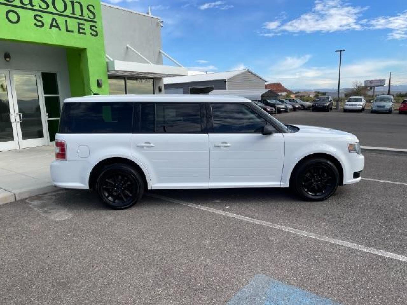 2014 White Suede /Charcoal Black Ford Flex SE FWD (2FMGK5B87EB) with an 3.5L V6 DOHC 24V engine, 6-Speed Automatic Overdrive transmission, located at 1865 East Red Hills Pkwy, St. George, 84770, (435) 628-0023, 37.120850, -113.543640 - We specialize in helping ALL people get the best financing available. No matter your credit score, good, bad or none we can get you an amazing rate. Had a bankruptcy, divorce, or repossessions? We give you the green light to get your credit back on the road. Low down and affordable payments that fit - Photo #11