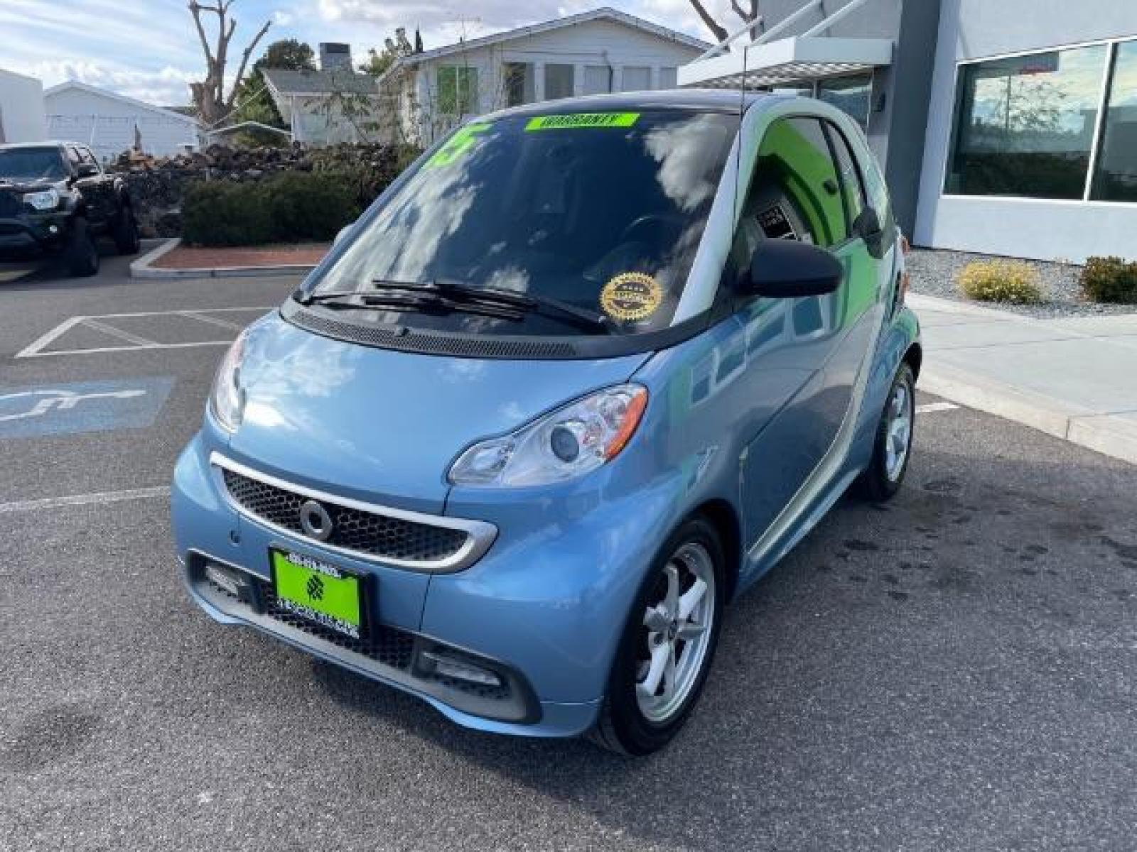2015 Light Blue Metallic /Design Black, cloth smart fortwo passion coupe (WMEEJ3BAXFK) with an 1.0L L3 DOHC 12V engine, 5-Speed Automatic transmission, located at 1865 East Red Hills Pkwy, St. George, 84770, (435) 628-0023, 37.120850, -113.543640 - We specialize in helping ALL people get the best financing available. No matter your credit score, good, bad or none we can get you an amazing rate. Had a bankruptcy, divorce, or repossessions? We give you the green light to get your credit back on the road. Low down and affordable payments that fit - Photo #1