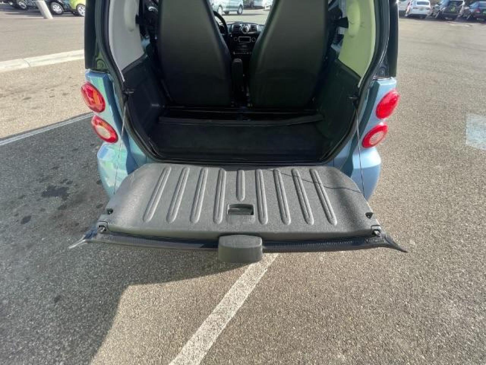 2015 Light Blue Metallic /Design Black, cloth smart fortwo passion coupe (WMEEJ3BAXFK) with an 1.0L L3 DOHC 12V engine, 5-Speed Automatic transmission, located at 1865 East Red Hills Pkwy, St. George, 84770, (435) 628-0023, 37.120850, -113.543640 - We specialize in helping ALL people get the best financing available. No matter your credit score, good, bad or none we can get you an amazing rate. Had a bankruptcy, divorce, or repossessions? We give you the green light to get your credit back on the road. Low down and affordable payments that fit - Photo #20