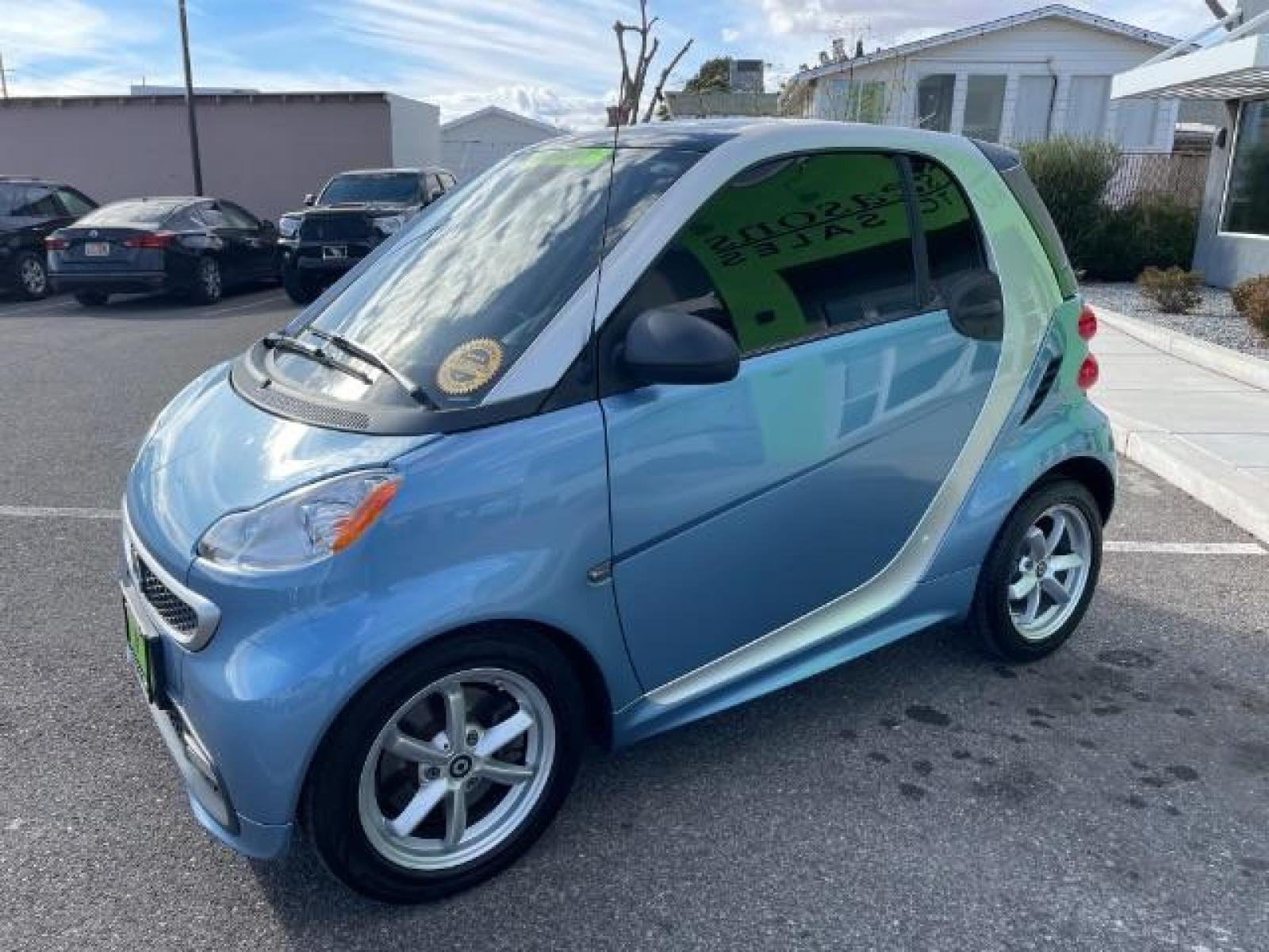 2015 Light Blue Metallic /Design Black, cloth smart fortwo passion coupe (WMEEJ3BAXFK) with an 1.0L L3 DOHC 12V engine, 5-Speed Automatic transmission, located at 1865 East Red Hills Pkwy, St. George, 84770, (435) 628-0023, 37.120850, -113.543640 - We specialize in helping ALL people get the best financing available. No matter your credit score, good, bad or none we can get you an amazing rate. Had a bankruptcy, divorce, or repossessions? We give you the green light to get your credit back on the road. Low down and affordable payments that fit - Photo #2