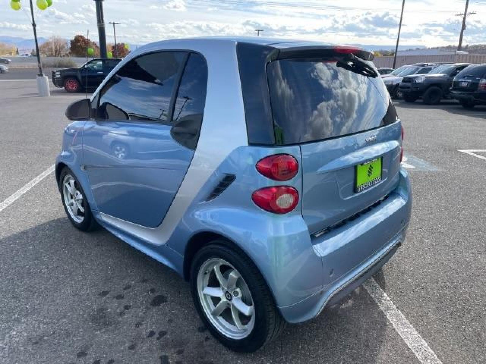 2015 Light Blue Metallic /Design Black, cloth smart fortwo passion coupe (WMEEJ3BAXFK) with an 1.0L L3 DOHC 12V engine, 5-Speed Automatic transmission, located at 1865 East Red Hills Pkwy, St. George, 84770, (435) 628-0023, 37.120850, -113.543640 - We specialize in helping ALL people get the best financing available. No matter your credit score, good, bad or none we can get you an amazing rate. Had a bankruptcy, divorce, or repossessions? We give you the green light to get your credit back on the road. Low down and affordable payments that fit - Photo #4