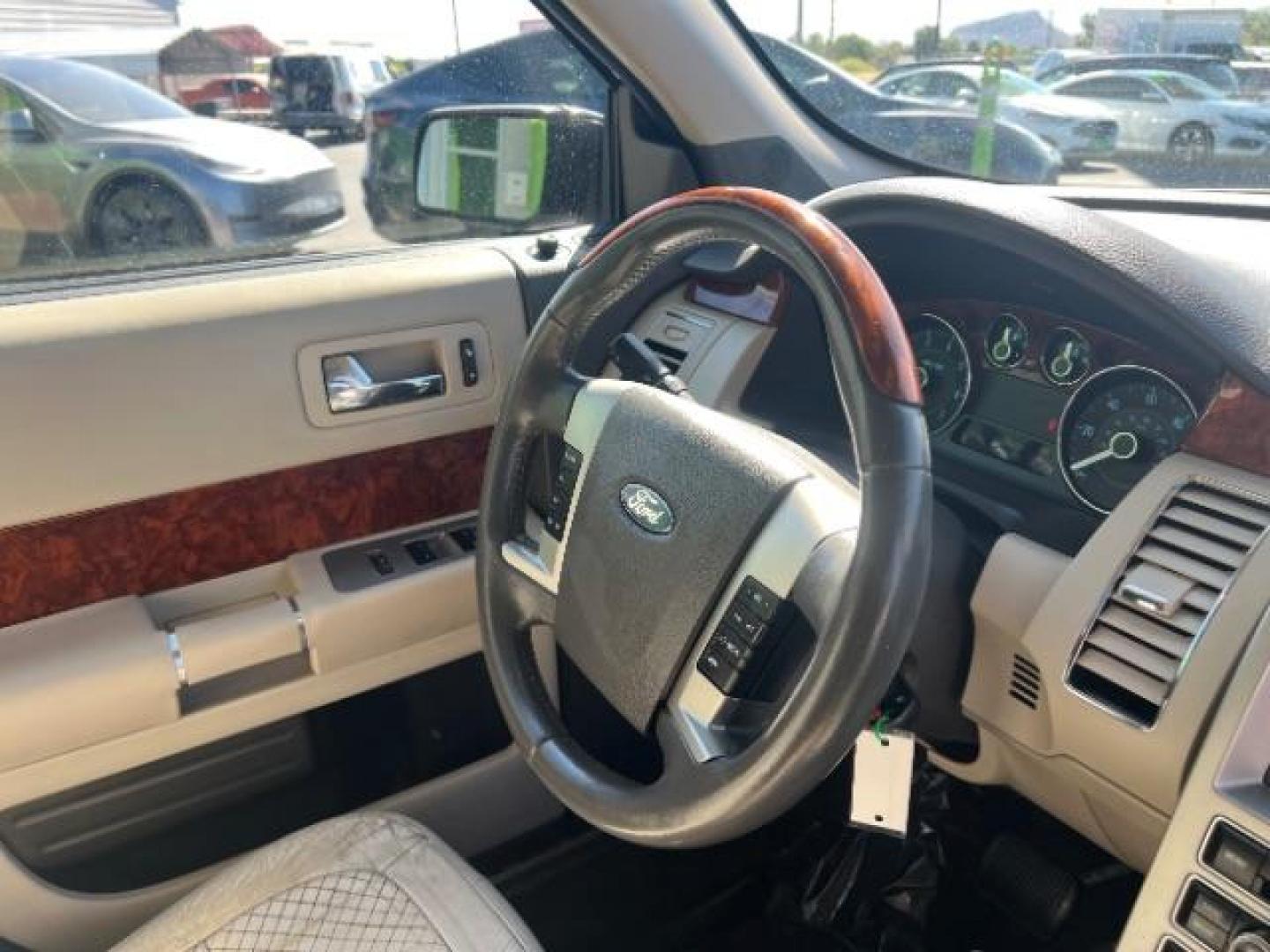 2011 Kona Blue Metallic /Medium Light Stone Leather Interior Ford Flex Limited FWD (2FMGK5DC3BB) with an 3.5L V6 DOHC 24V engine, 6-Speed Automatic Overdrive transmission, located at 1865 East Red Hills Pkwy, St. George, 84770, (435) 628-0023, 37.120850, -113.543640 - We specialize in helping ALL people get the best financing available. No matter your credit score, good, bad or none we can get you an amazing rate. Had a bankruptcy, divorce, or repossessions? We give you the green light to get your credit back on the road. Low down and affordable payments that fit- Photo#33