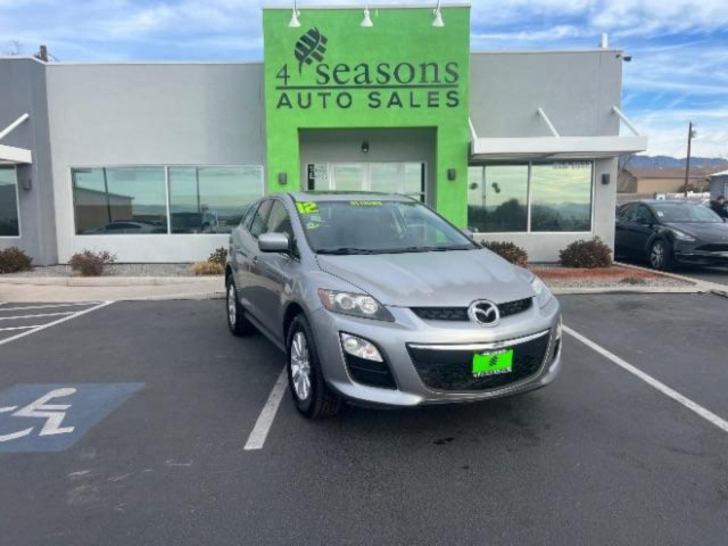 2012 Liquid Silver Metallic /Black Cloth Interior Mazda CX-7 i Sport (JM3ER2BM5C0) with an 2.5L L4 DOHC 16V engine, 5-Speed Automatic transmission, located at 1865 East Red Hills Pkwy, St. George, 84770, (435) 628-0023, 37.120850, -113.543640 - We specialize in helping ALL people get the best financing available. No matter your credit score, good, bad or none we can get you an amazing rate. Had a bankruptcy, divorce, or repossessions? We give you the green light to get your credit back on the road. Low down and affordable payments that fit - Photo#0