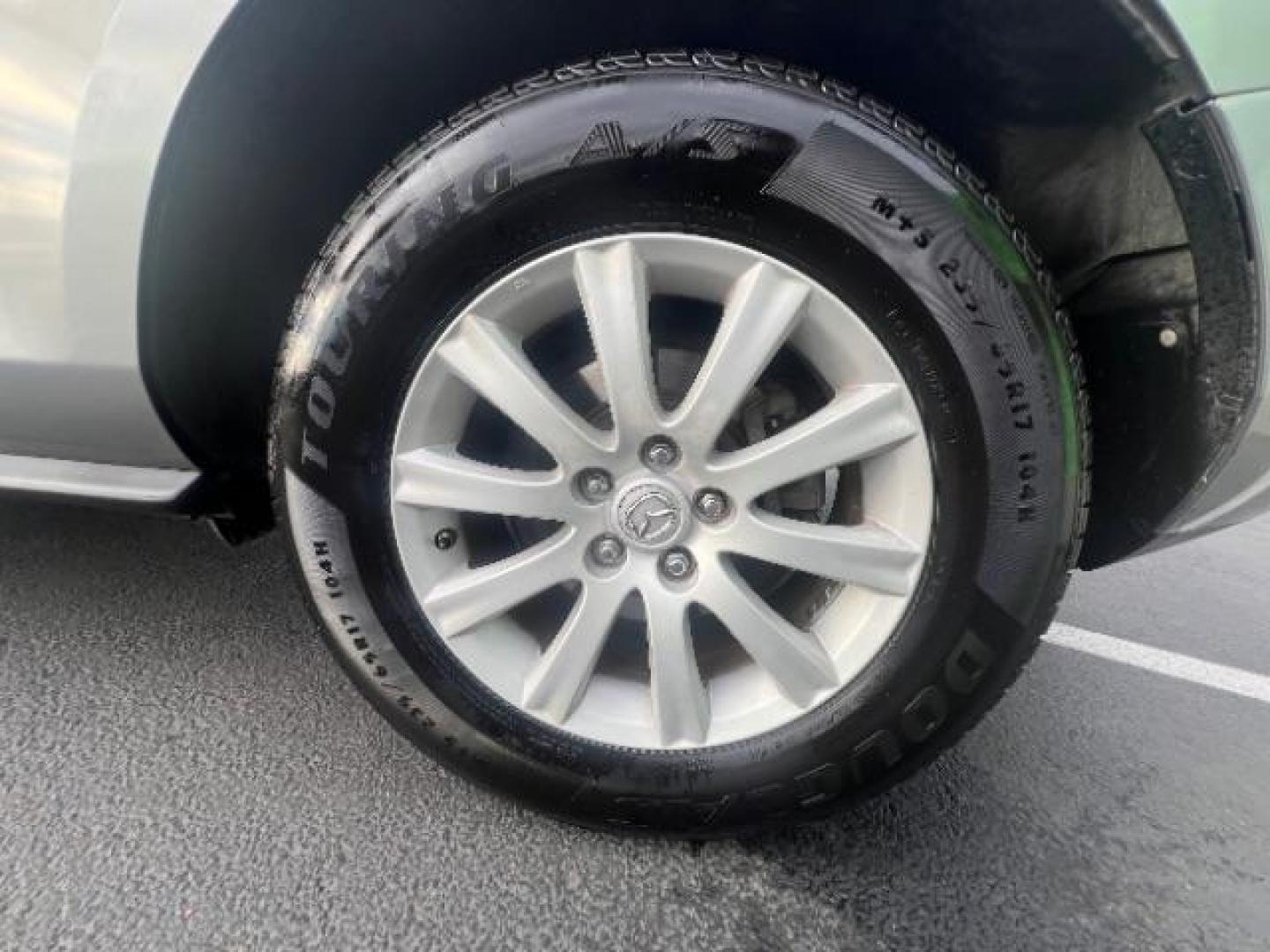 2012 Liquid Silver Metallic /Black Cloth Interior Mazda CX-7 i Sport (JM3ER2BM5C0) with an 2.5L L4 DOHC 16V engine, 5-Speed Automatic transmission, located at 1865 East Red Hills Pkwy, St. George, 84770, (435) 628-0023, 37.120850, -113.543640 - We specialize in helping ALL people get the best financing available. No matter your credit score, good, bad or none we can get you an amazing rate. Had a bankruptcy, divorce, or repossessions? We give you the green light to get your credit back on the road. Low down and affordable payments that fit - Photo#10