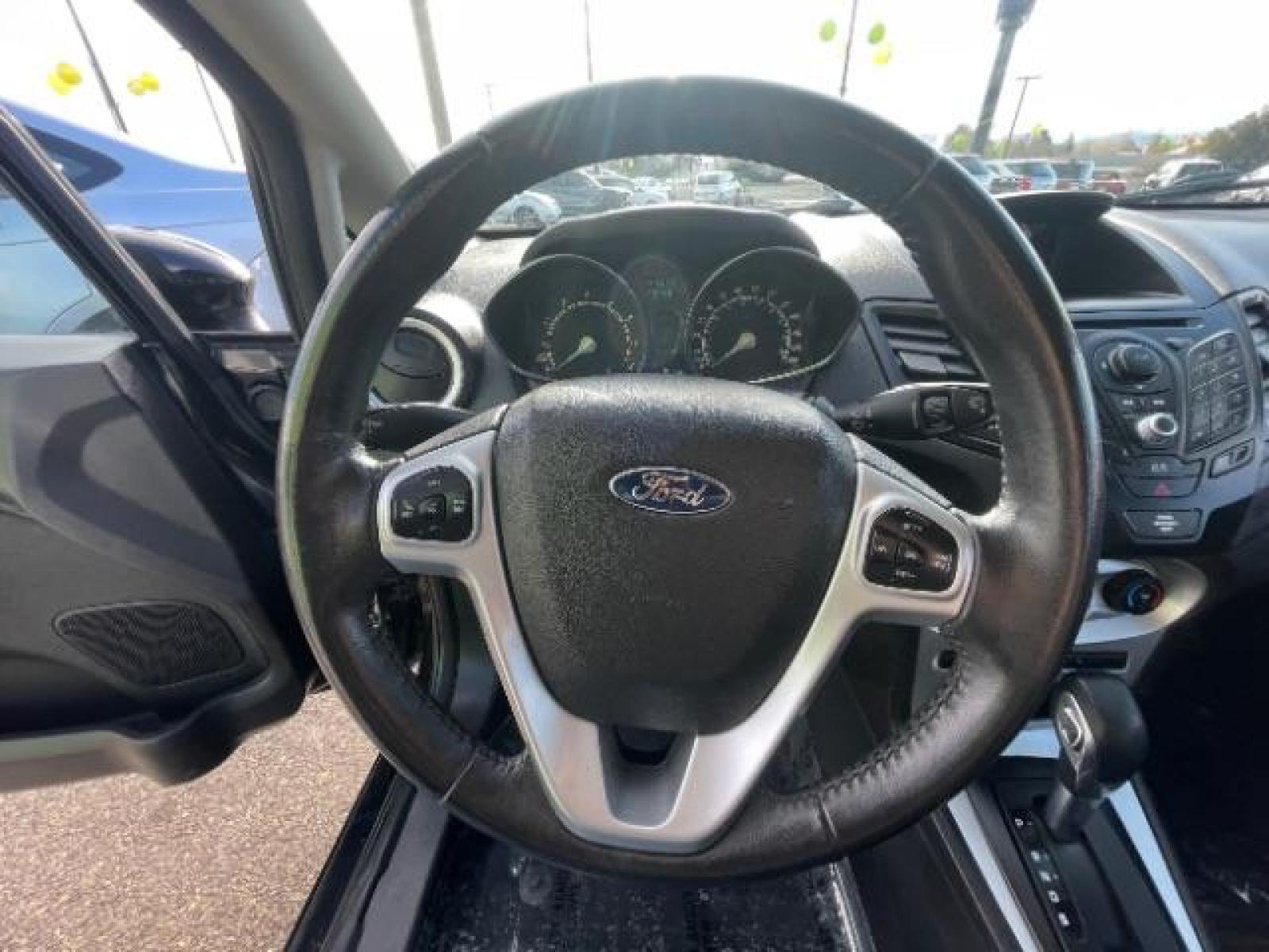 2014 Tuxedo Black Metallic /Charcoal Black Ford Fiesta SE Hatchback (3FADP4EJ0EM) with an 1.6L L4 DOHC 16V engine, 6-Speed Automatic transmission, located at 1865 East Red Hills Pkwy, St. George, 84770, (435) 628-0023, 37.120850, -113.543640 - We specialize in helping ALL people get the best financing available. No matter your credit score, good, bad or none we can get you an amazing rate. Had a bankruptcy, divorce, or repossessions? We give you the green light to get your credit back on the road. Low down and affordable payments that fit - Photo #13