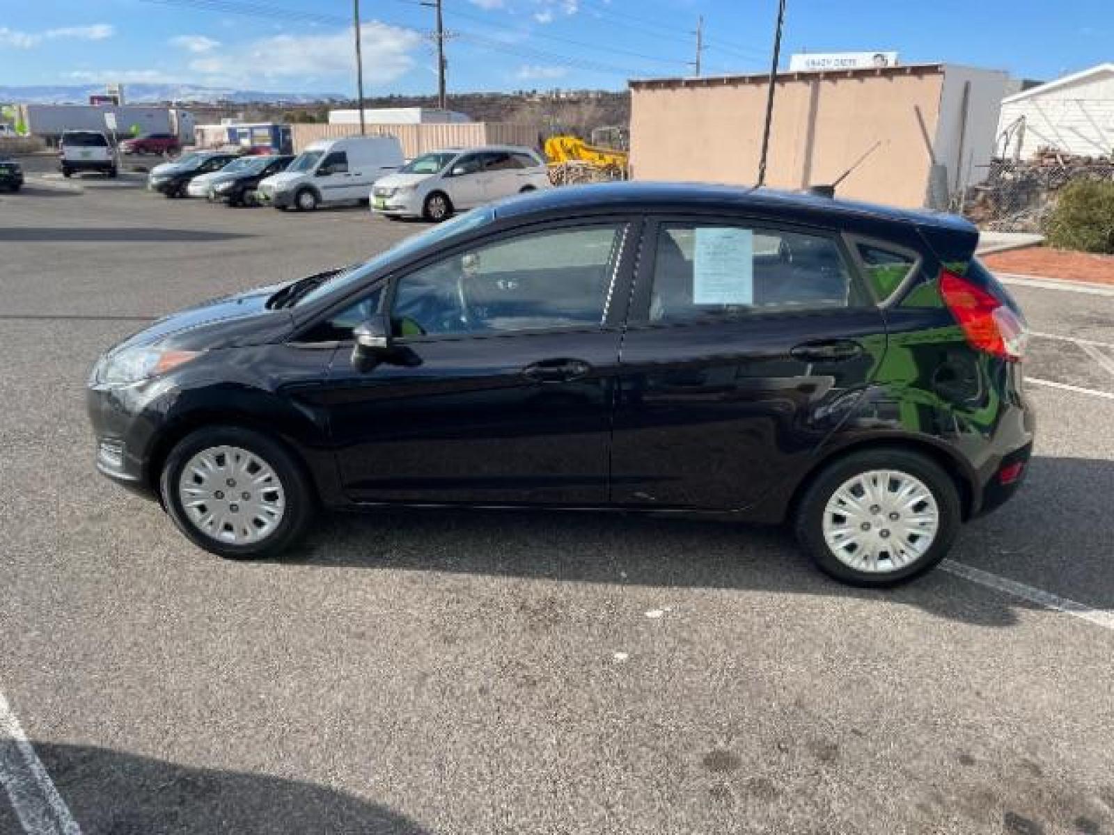 2014 Tuxedo Black Metallic /Charcoal Black Ford Fiesta SE Hatchback (3FADP4EJ0EM) with an 1.6L L4 DOHC 16V engine, 6-Speed Automatic transmission, located at 1865 East Red Hills Pkwy, St. George, 84770, (435) 628-0023, 37.120850, -113.543640 - We specialize in helping ALL people get the best financing available. No matter your credit score, good, bad or none we can get you an amazing rate. Had a bankruptcy, divorce, or repossessions? We give you the green light to get your credit back on the road. Low down and affordable payments that fit - Photo #4