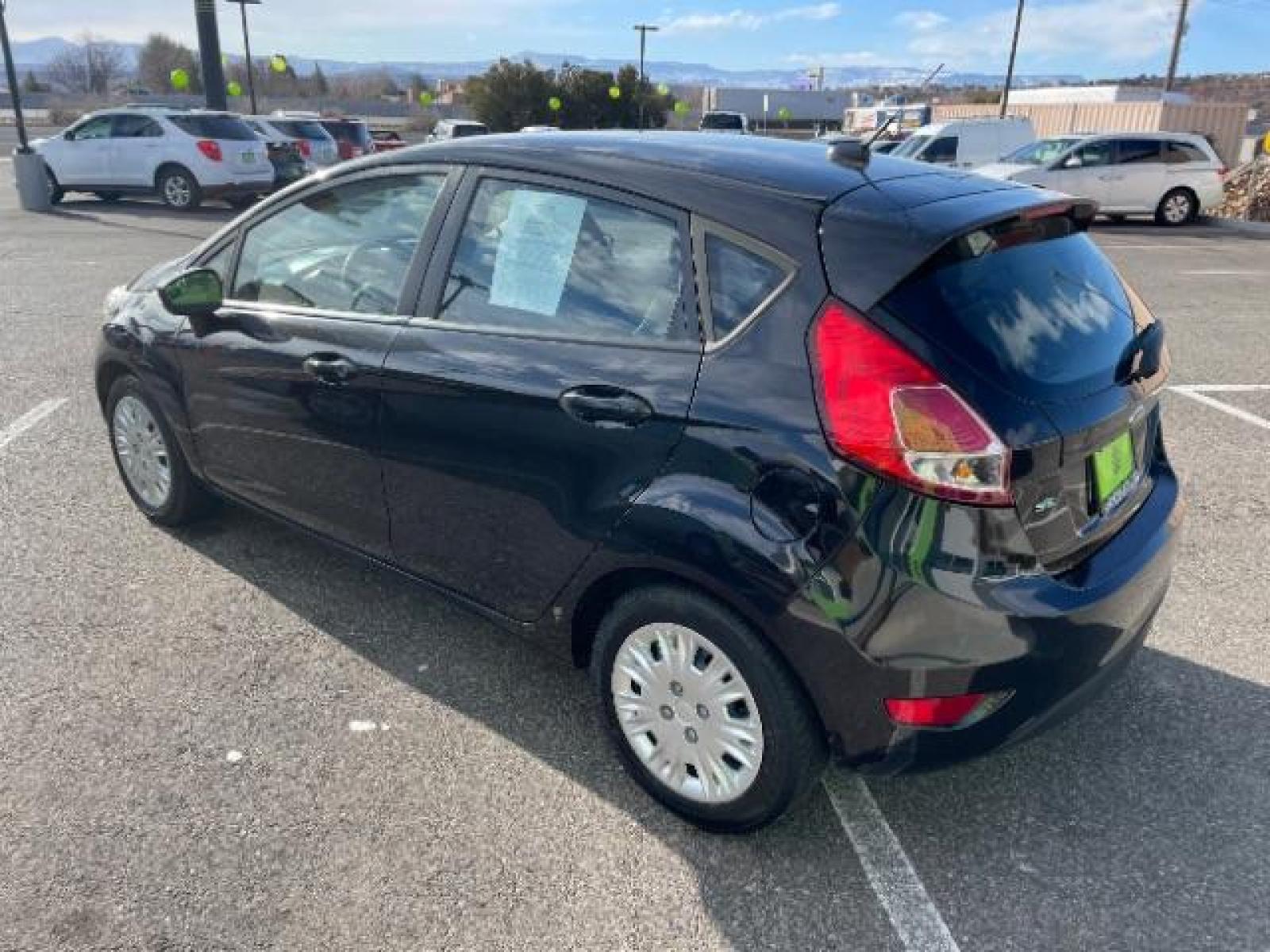 2014 Tuxedo Black Metallic /Charcoal Black Ford Fiesta SE Hatchback (3FADP4EJ0EM) with an 1.6L L4 DOHC 16V engine, 6-Speed Automatic transmission, located at 1865 East Red Hills Pkwy, St. George, 84770, (435) 628-0023, 37.120850, -113.543640 - We specialize in helping ALL people get the best financing available. No matter your credit score, good, bad or none we can get you an amazing rate. Had a bankruptcy, divorce, or repossessions? We give you the green light to get your credit back on the road. Low down and affordable payments that fit - Photo #5