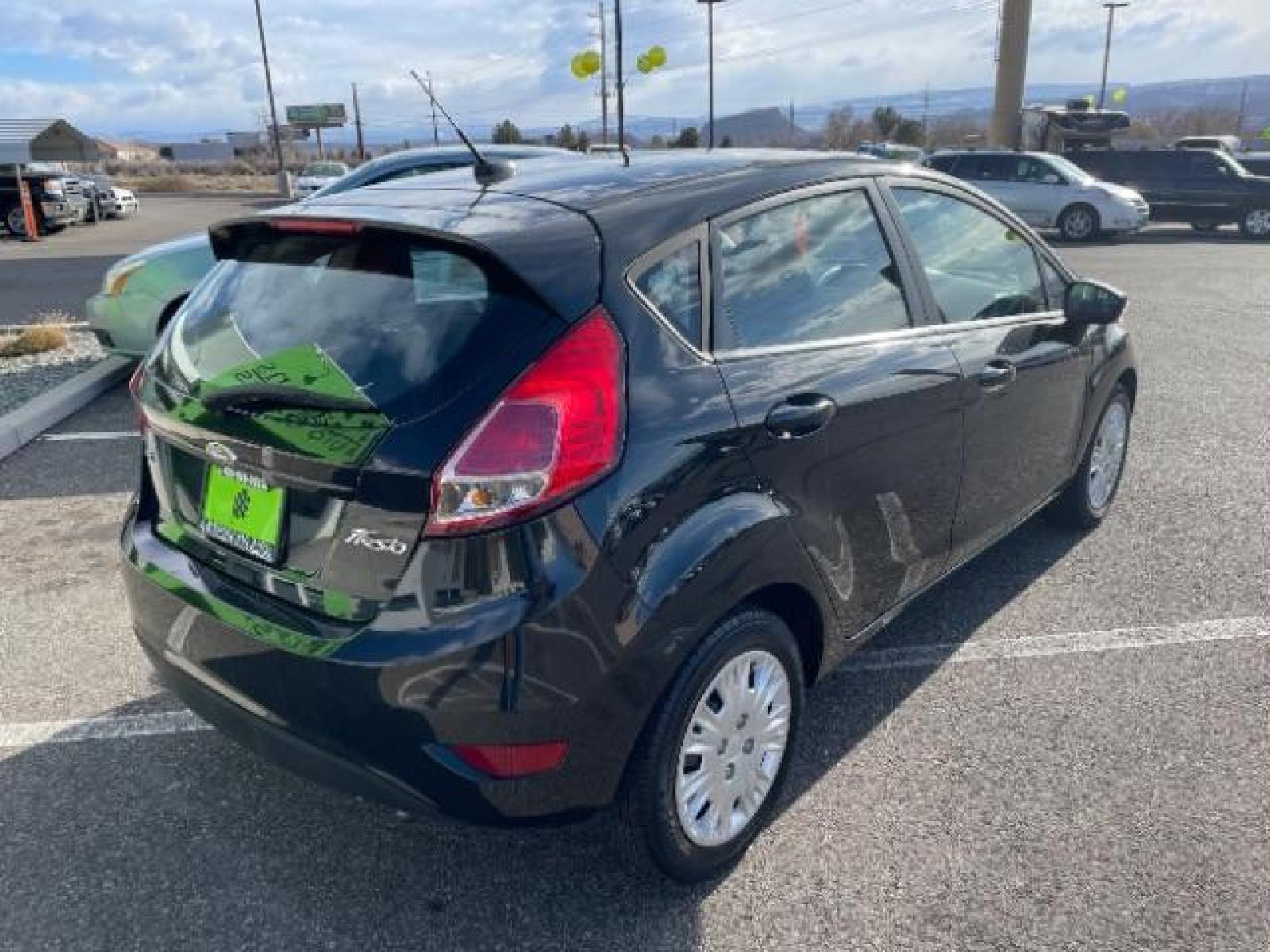 2014 Tuxedo Black Metallic /Charcoal Black Ford Fiesta SE Hatchback (3FADP4EJ0EM) with an 1.6L L4 DOHC 16V engine, 6-Speed Automatic transmission, located at 1865 East Red Hills Pkwy, St. George, 84770, (435) 628-0023, 37.120850, -113.543640 - We specialize in helping ALL people get the best financing available. No matter your credit score, good, bad or none we can get you an amazing rate. Had a bankruptcy, divorce, or repossessions? We give you the green light to get your credit back on the road. Low down and affordable payments that fit - Photo #8