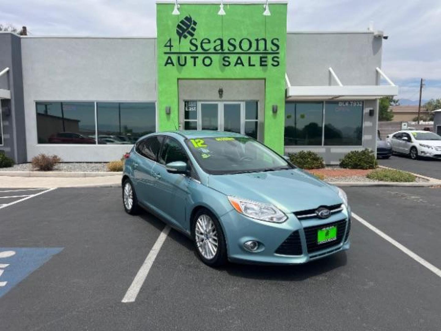 2012 Frosted Glass /Medium Light Stone C Ford Focus SEL (1FAHP3M20CL) with an 2.0L L4 DOHC 16V engine, 6-Speed Automatic transmission, located at 940 North Main Street, Cedar City, UT, 84720, (435) 628-0023, 37.692936, -113.061897 - We specialize in helping ALL people get the best financing available. No matter your credit score, good, bad or none we can get you an amazing rate. Had a bankruptcy, divorce, or repossessions? We give you the green light to get your credit back on the road. Low down and affordable payments that fit - Photo#0