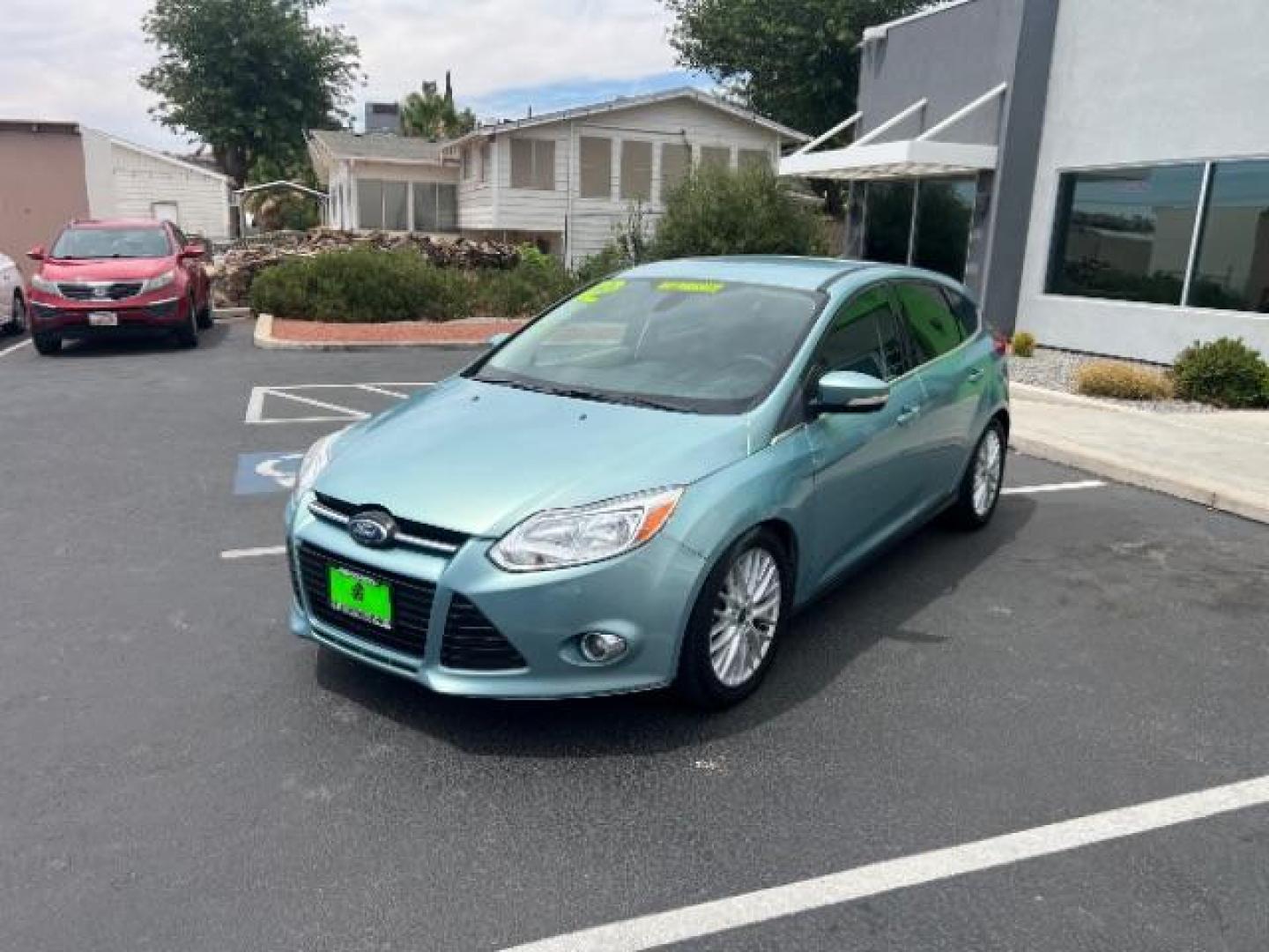 2012 Frosted Glass /Medium Light Stone C Ford Focus SEL (1FAHP3M20CL) with an 2.0L L4 DOHC 16V engine, 6-Speed Automatic transmission, located at 940 North Main Street, Cedar City, UT, 84720, (435) 628-0023, 37.692936, -113.061897 - We specialize in helping ALL people get the best financing available. No matter your credit score, good, bad or none we can get you an amazing rate. Had a bankruptcy, divorce, or repossessions? We give you the green light to get your credit back on the road. Low down and affordable payments that fit - Photo#2