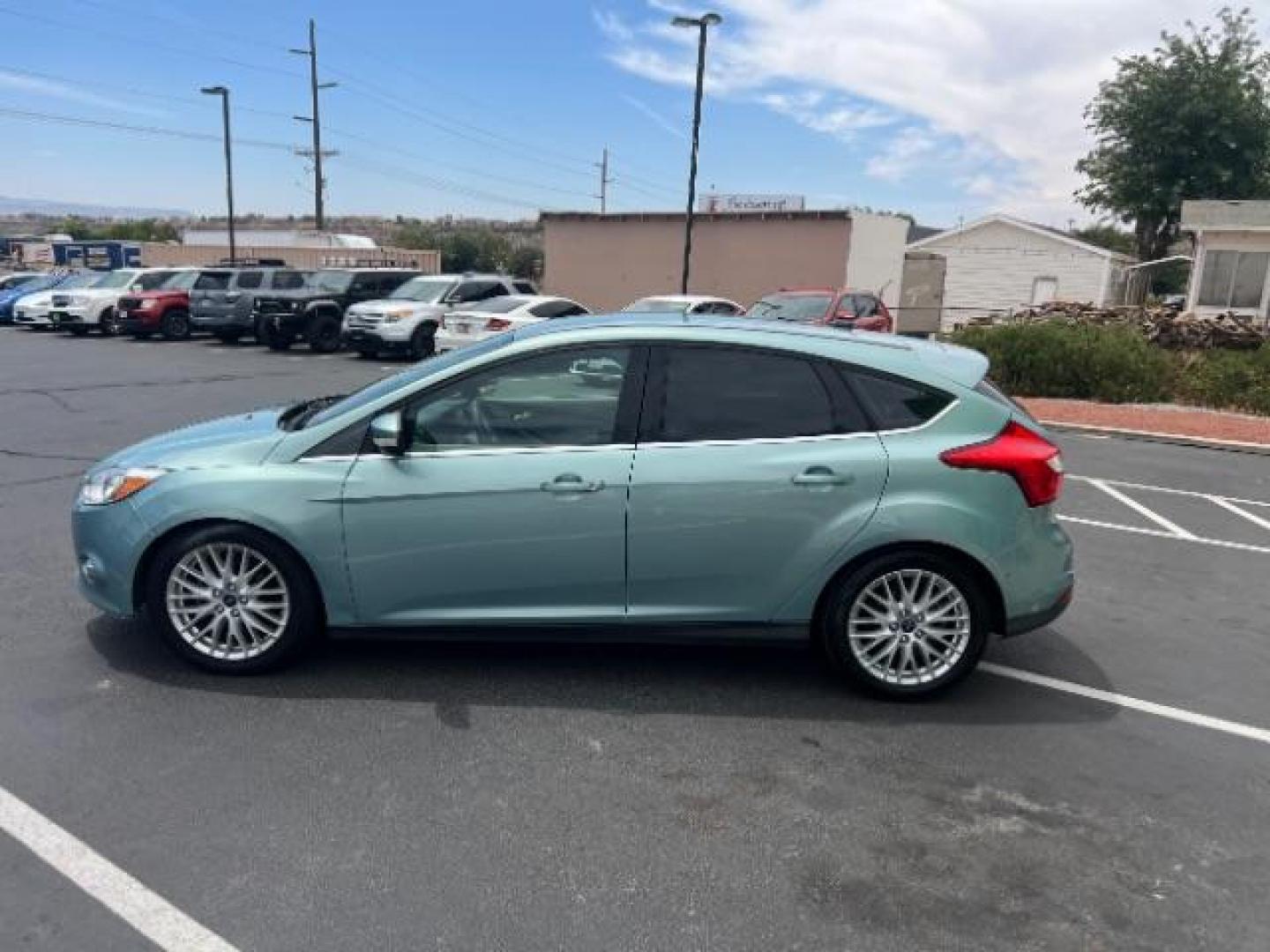 2012 Frosted Glass /Medium Light Stone C Ford Focus SEL (1FAHP3M20CL) with an 2.0L L4 DOHC 16V engine, 6-Speed Automatic transmission, located at 940 North Main Street, Cedar City, UT, 84720, (435) 628-0023, 37.692936, -113.061897 - We specialize in helping ALL people get the best financing available. No matter your credit score, good, bad or none we can get you an amazing rate. Had a bankruptcy, divorce, or repossessions? We give you the green light to get your credit back on the road. Low down and affordable payments that fit - Photo#3