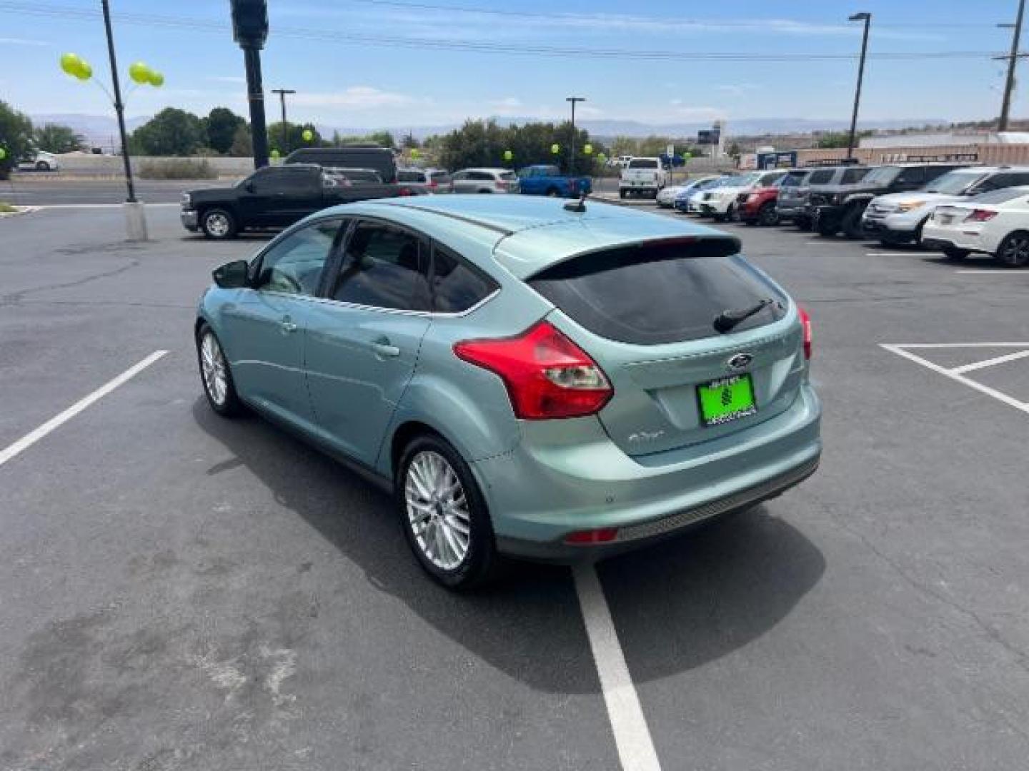 2012 Frosted Glass /Medium Light Stone C Ford Focus SEL (1FAHP3M20CL) with an 2.0L L4 DOHC 16V engine, 6-Speed Automatic transmission, located at 940 North Main Street, Cedar City, UT, 84720, (435) 628-0023, 37.692936, -113.061897 - We specialize in helping ALL people get the best financing available. No matter your credit score, good, bad or none we can get you an amazing rate. Had a bankruptcy, divorce, or repossessions? We give you the green light to get your credit back on the road. Low down and affordable payments that fit - Photo#4