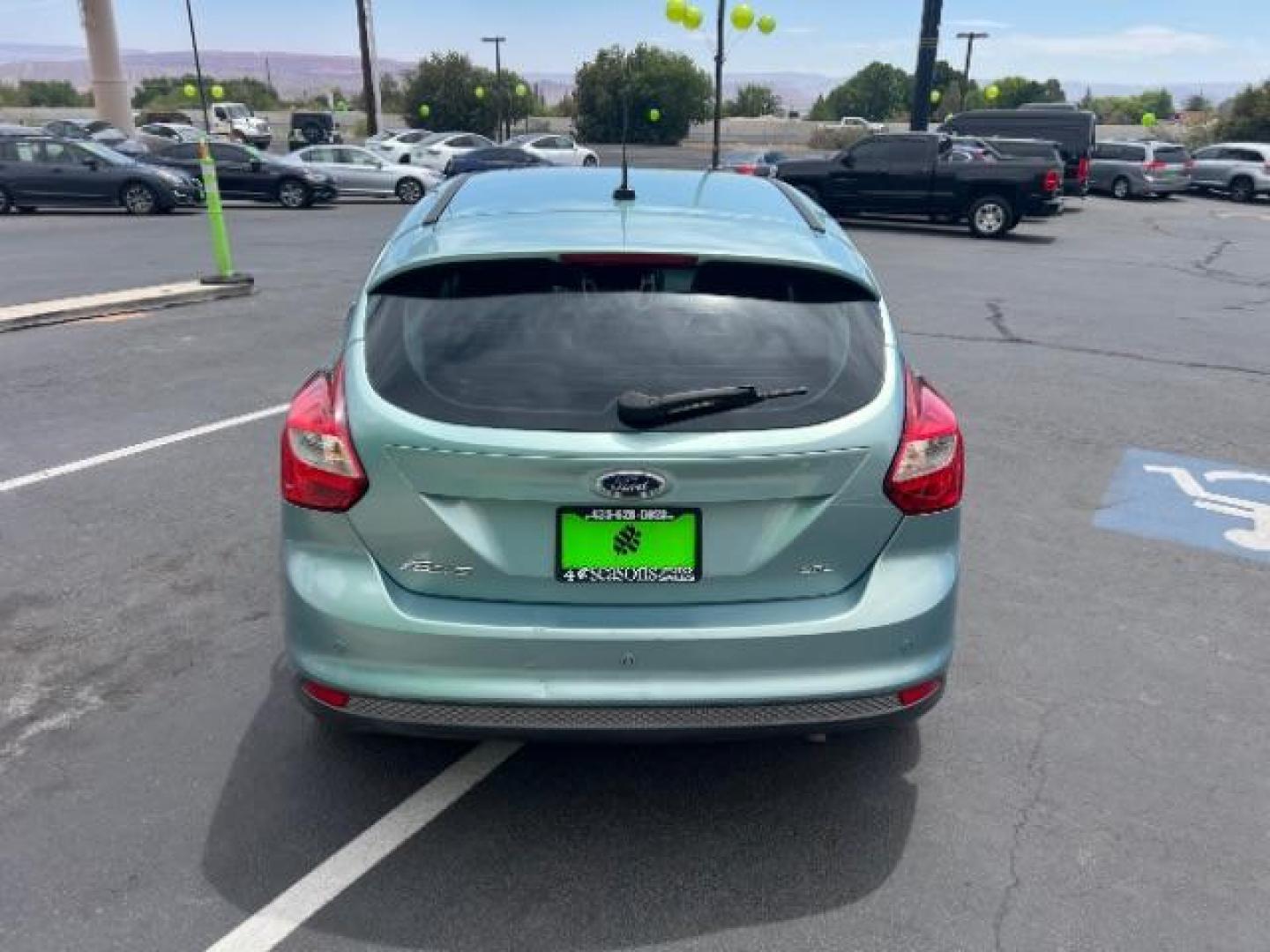 2012 Frosted Glass /Medium Light Stone C Ford Focus SEL (1FAHP3M20CL) with an 2.0L L4 DOHC 16V engine, 6-Speed Automatic transmission, located at 940 North Main Street, Cedar City, UT, 84720, (435) 628-0023, 37.692936, -113.061897 - We specialize in helping ALL people get the best financing available. No matter your credit score, good, bad or none we can get you an amazing rate. Had a bankruptcy, divorce, or repossessions? We give you the green light to get your credit back on the road. Low down and affordable payments that fit - Photo#5