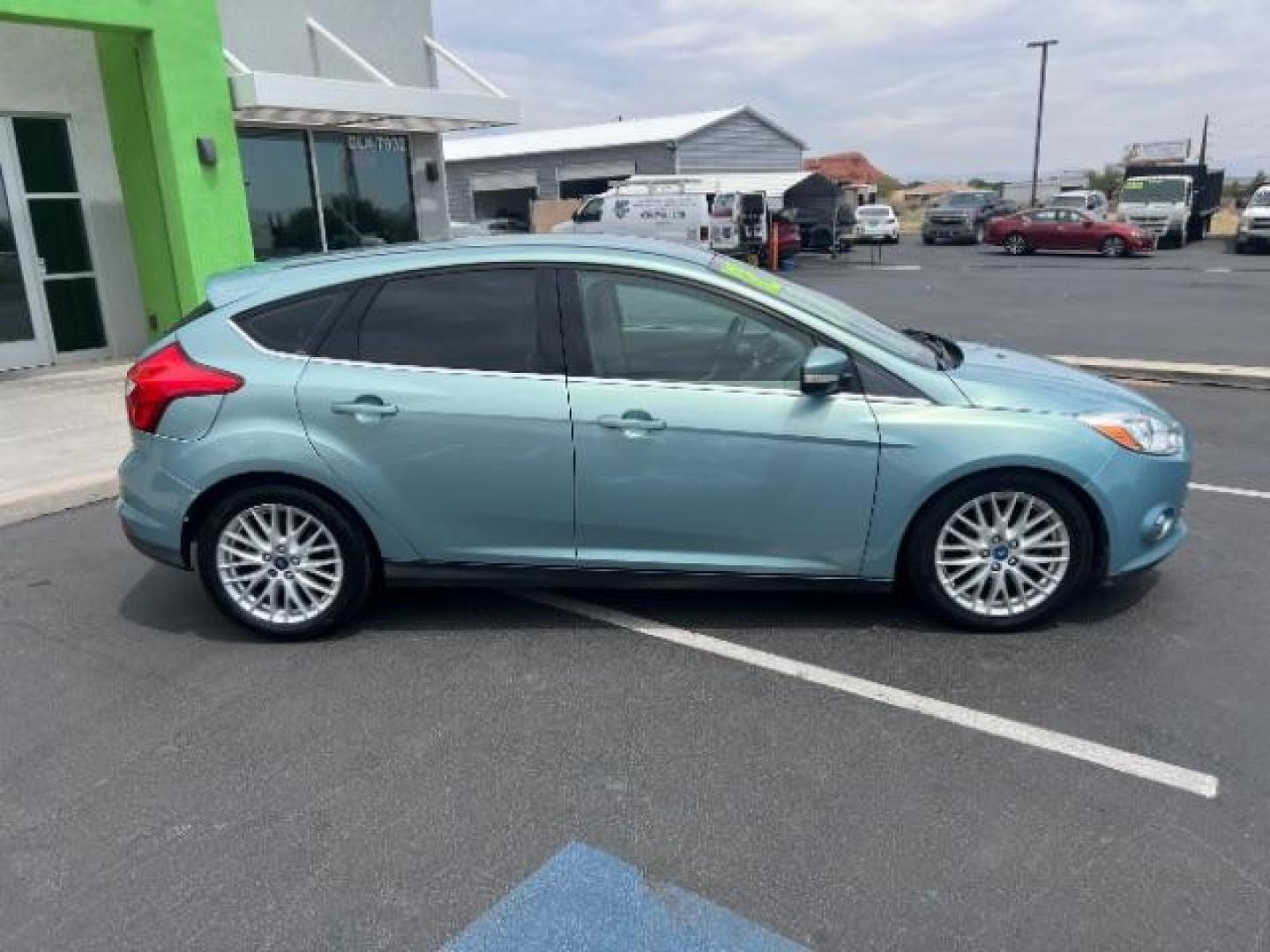 2012 Frosted Glass /Medium Light Stone C Ford Focus SEL (1FAHP3M20CL) with an 2.0L L4 DOHC 16V engine, 6-Speed Automatic transmission, located at 940 North Main Street, Cedar City, UT, 84720, (435) 628-0023, 37.692936, -113.061897 - We specialize in helping ALL people get the best financing available. No matter your credit score, good, bad or none we can get you an amazing rate. Had a bankruptcy, divorce, or repossessions? We give you the green light to get your credit back on the road. Low down and affordable payments that fit - Photo#7