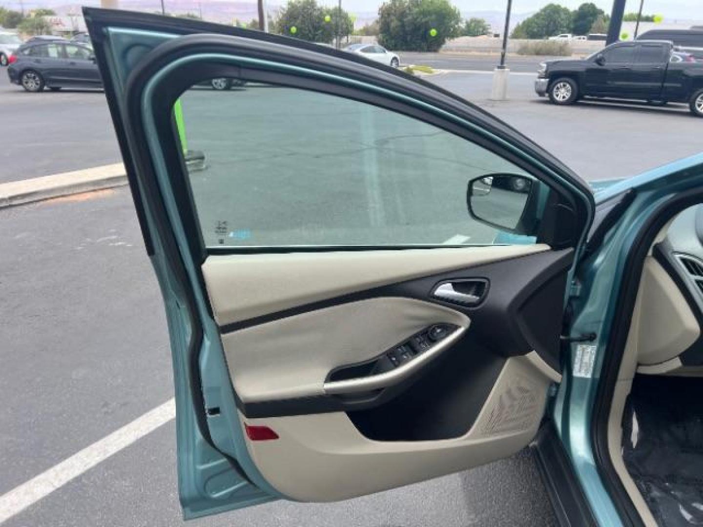 2012 Frosted Glass /Medium Light Stone C Ford Focus SEL (1FAHP3M20CL) with an 2.0L L4 DOHC 16V engine, 6-Speed Automatic transmission, located at 940 North Main Street, Cedar City, UT, 84720, (435) 628-0023, 37.692936, -113.061897 - We specialize in helping ALL people get the best financing available. No matter your credit score, good, bad or none we can get you an amazing rate. Had a bankruptcy, divorce, or repossessions? We give you the green light to get your credit back on the road. Low down and affordable payments that fit - Photo#12