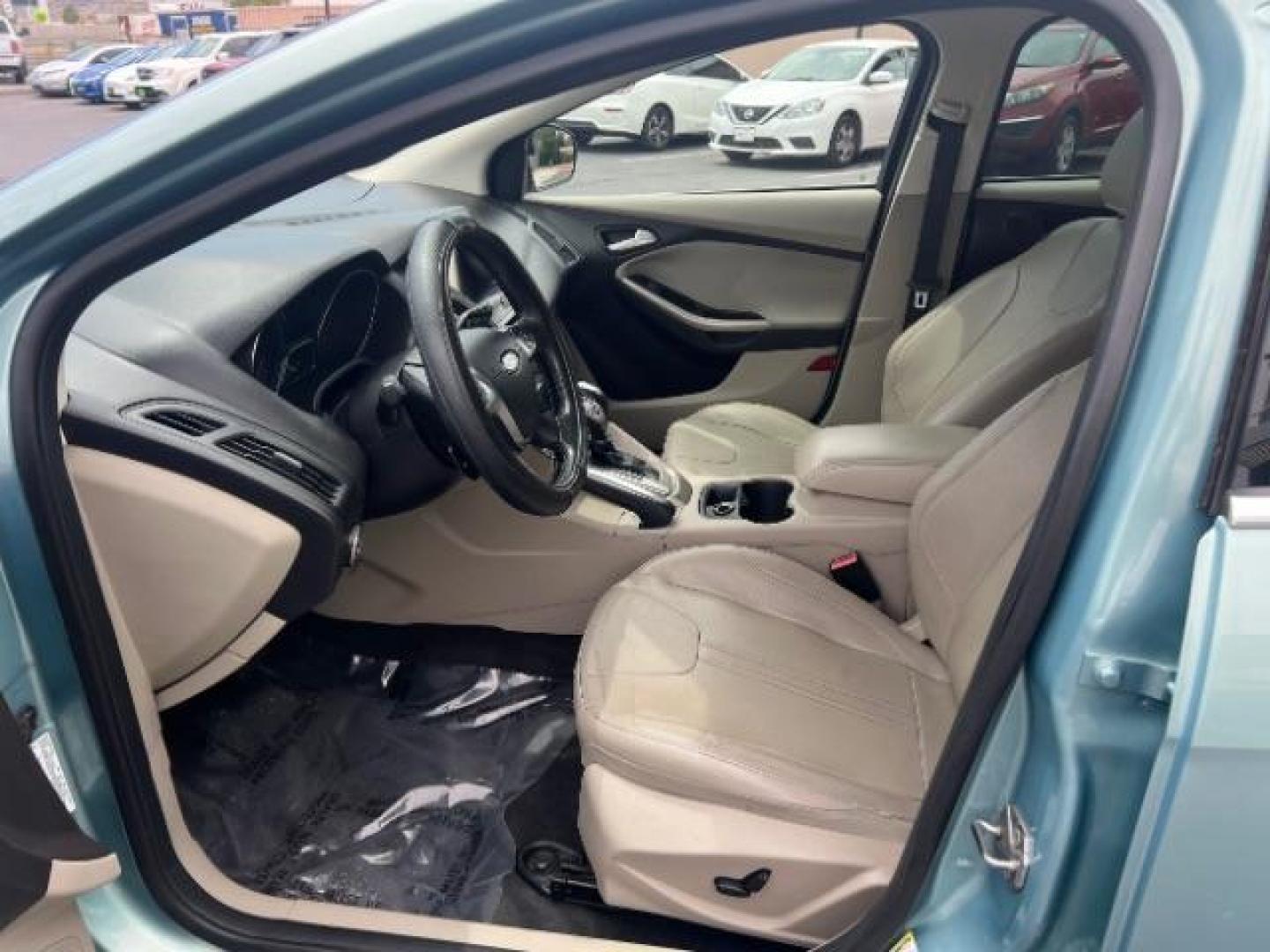 2012 Frosted Glass /Medium Light Stone C Ford Focus SEL (1FAHP3M20CL) with an 2.0L L4 DOHC 16V engine, 6-Speed Automatic transmission, located at 940 North Main Street, Cedar City, UT, 84720, (435) 628-0023, 37.692936, -113.061897 - We specialize in helping ALL people get the best financing available. No matter your credit score, good, bad or none we can get you an amazing rate. Had a bankruptcy, divorce, or repossessions? We give you the green light to get your credit back on the road. Low down and affordable payments that fit - Photo#14