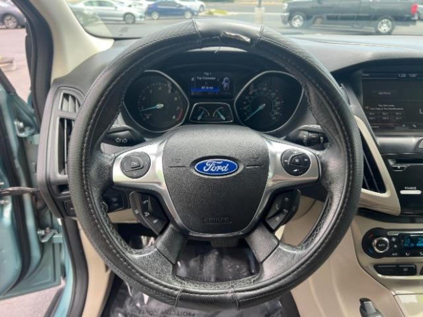 2012 Frosted Glass /Medium Light Stone C Ford Focus SEL (1FAHP3M20CL) with an 2.0L L4 DOHC 16V engine, 6-Speed Automatic transmission, located at 940 North Main Street, Cedar City, UT, 84720, (435) 628-0023, 37.692936, -113.061897 - We specialize in helping ALL people get the best financing available. No matter your credit score, good, bad or none we can get you an amazing rate. Had a bankruptcy, divorce, or repossessions? We give you the green light to get your credit back on the road. Low down and affordable payments that fit - Photo#15