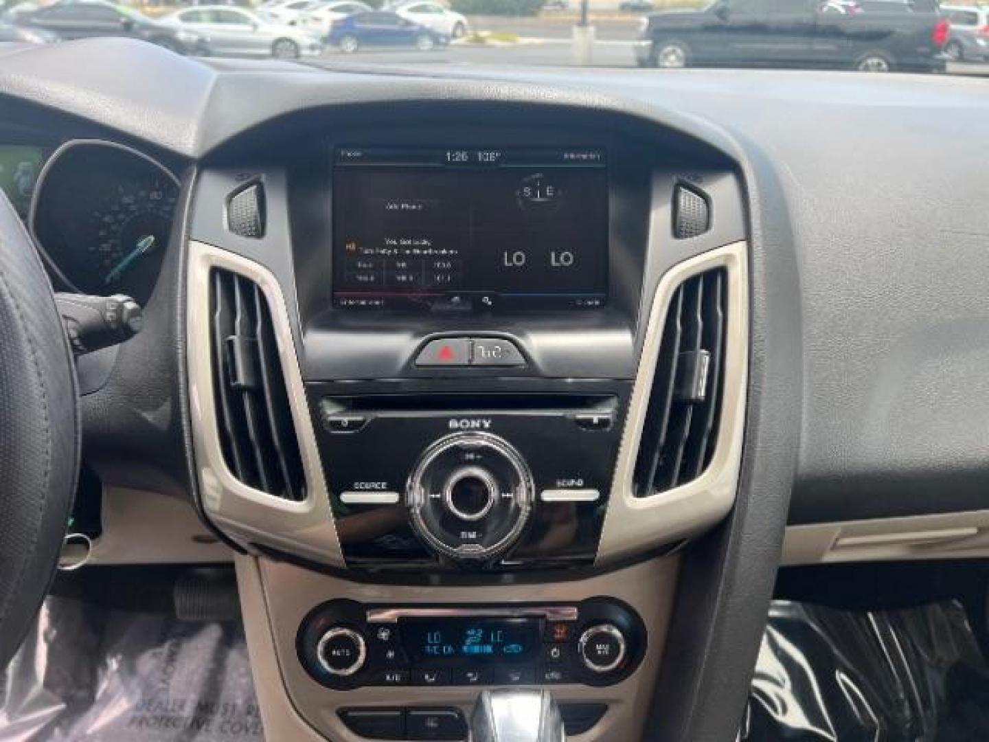 2012 Frosted Glass /Medium Light Stone C Ford Focus SEL (1FAHP3M20CL) with an 2.0L L4 DOHC 16V engine, 6-Speed Automatic transmission, located at 940 North Main Street, Cedar City, UT, 84720, (435) 628-0023, 37.692936, -113.061897 - We specialize in helping ALL people get the best financing available. No matter your credit score, good, bad or none we can get you an amazing rate. Had a bankruptcy, divorce, or repossessions? We give you the green light to get your credit back on the road. Low down and affordable payments that fit - Photo#17