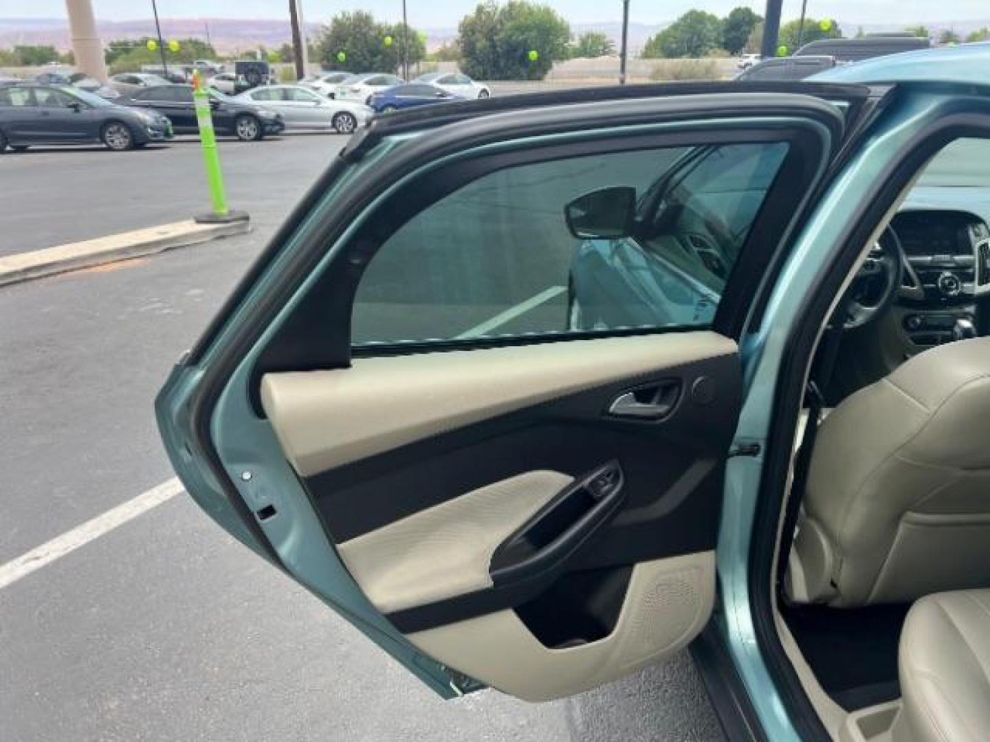 2012 Frosted Glass /Medium Light Stone C Ford Focus SEL (1FAHP3M20CL) with an 2.0L L4 DOHC 16V engine, 6-Speed Automatic transmission, located at 940 North Main Street, Cedar City, UT, 84720, (435) 628-0023, 37.692936, -113.061897 - We specialize in helping ALL people get the best financing available. No matter your credit score, good, bad or none we can get you an amazing rate. Had a bankruptcy, divorce, or repossessions? We give you the green light to get your credit back on the road. Low down and affordable payments that fit - Photo#20