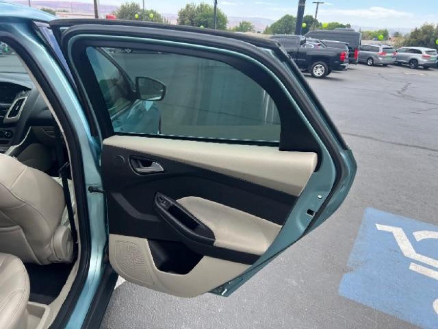 2012 Frosted Glass /Medium Light Stone C Ford Focus SEL (1FAHP3M20CL) with an 2.0L L4 DOHC 16V engine, 6-Speed Automatic transmission, located at 940 North Main Street, Cedar City, UT, 84720, (435) 628-0023, 37.692936, -113.061897 - We specialize in helping ALL people get the best financing available. No matter your credit score, good, bad or none we can get you an amazing rate. Had a bankruptcy, divorce, or repossessions? We give you the green light to get your credit back on the road. Low down and affordable payments that fit - Photo#26