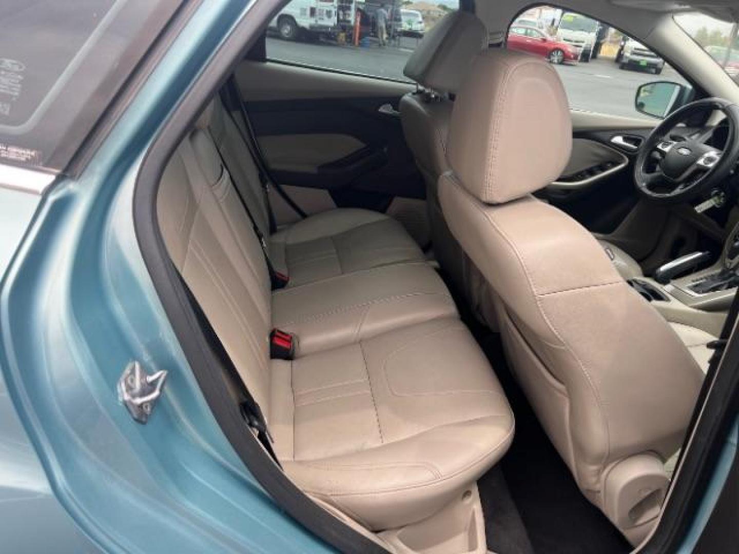 2012 Frosted Glass /Medium Light Stone C Ford Focus SEL (1FAHP3M20CL) with an 2.0L L4 DOHC 16V engine, 6-Speed Automatic transmission, located at 940 North Main Street, Cedar City, UT, 84720, (435) 628-0023, 37.692936, -113.061897 - We specialize in helping ALL people get the best financing available. No matter your credit score, good, bad or none we can get you an amazing rate. Had a bankruptcy, divorce, or repossessions? We give you the green light to get your credit back on the road. Low down and affordable payments that fit - Photo#27