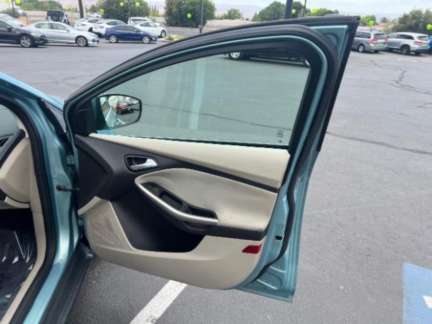 2012 Frosted Glass /Medium Light Stone C Ford Focus SEL (1FAHP3M20CL) with an 2.0L L4 DOHC 16V engine, 6-Speed Automatic transmission, located at 940 North Main Street, Cedar City, UT, 84720, (435) 628-0023, 37.692936, -113.061897 - We specialize in helping ALL people get the best financing available. No matter your credit score, good, bad or none we can get you an amazing rate. Had a bankruptcy, divorce, or repossessions? We give you the green light to get your credit back on the road. Low down and affordable payments that fit - Photo#28