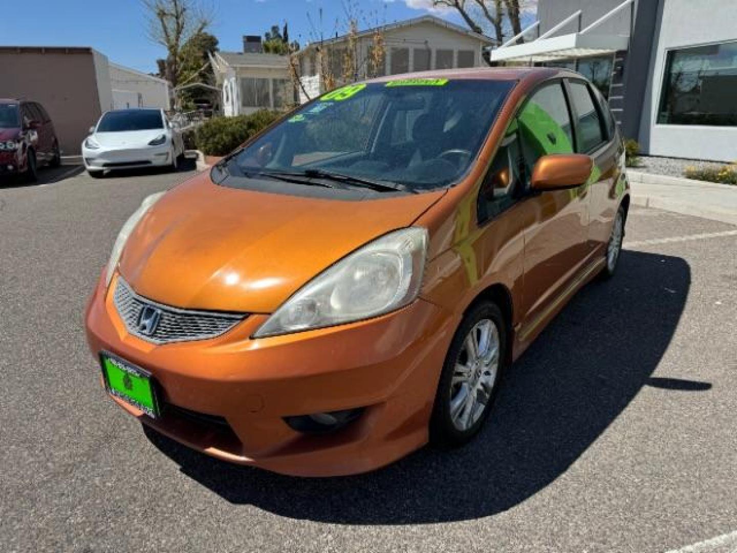 2009 Orange Revolution Me /Black Cloth Interior Honda Fit Sport 5-Speed AT (JHMGE88409S) with an 1.5L L4 SOHC 16V engine, 5-Speed Automatic transmission, located at 1865 East Red Hills Pkwy, St. George, 84770, (435) 628-0023, 37.120850, -113.543640 - We specialize in helping ALL people get the best financing available. No matter your credit score, good, bad or none we can get you an amazing rate. Had a bankruptcy, divorce, or repossessions? We give you the green light to get your credit back on the road. Low down and affordable payments that fit - Photo#3