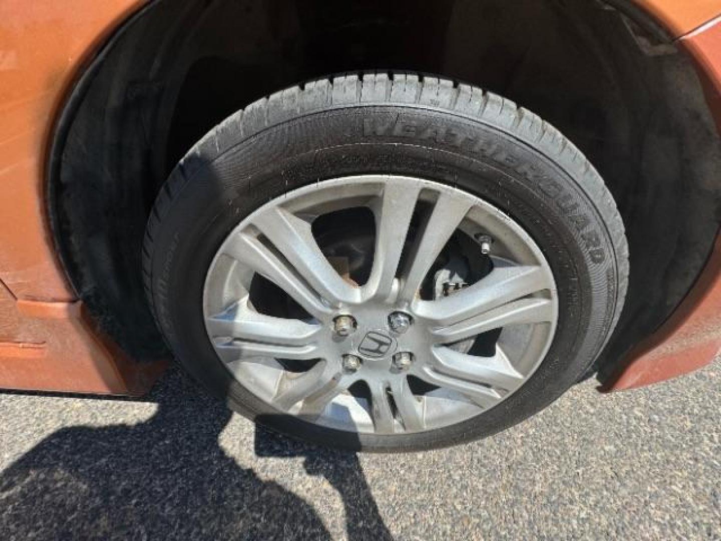 2009 Orange Revolution Me /Black Cloth Interior Honda Fit Sport 5-Speed AT (JHMGE88409S) with an 1.5L L4 SOHC 16V engine, 5-Speed Automatic transmission, located at 1865 East Red Hills Pkwy, St. George, 84770, (435) 628-0023, 37.120850, -113.543640 - We specialize in helping ALL people get the best financing available. No matter your credit score, good, bad or none we can get you an amazing rate. Had a bankruptcy, divorce, or repossessions? We give you the green light to get your credit back on the road. Low down and affordable payments that fit - Photo#12