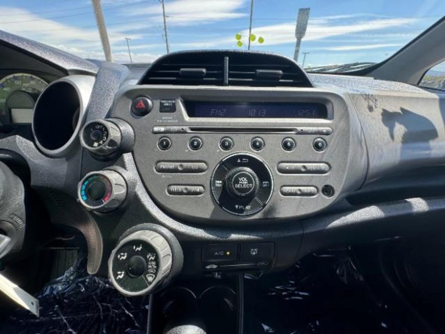 2009 Orange Revolution Me /Black Cloth Interior Honda Fit Sport 5-Speed AT (JHMGE88409S) with an 1.5L L4 SOHC 16V engine, 5-Speed Automatic transmission, located at 1865 East Red Hills Pkwy, St. George, 84770, (435) 628-0023, 37.120850, -113.543640 - We specialize in helping ALL people get the best financing available. No matter your credit score, good, bad or none we can get you an amazing rate. Had a bankruptcy, divorce, or repossessions? We give you the green light to get your credit back on the road. Low down and affordable payments that fit - Photo#22