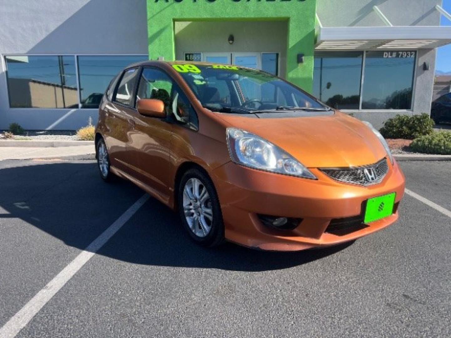 2009 Orange Revolution Metallic /Black Cloth Interior Honda Fit Sport 5-Speed AT (JHMGE88409S) with an 1.5L L4 SOHC 16V engine, 5-Speed Automatic transmission, located at 1865 East Red Hills Pkwy, St. George, 84770, (435) 628-0023, 37.120850, -113.543640 - We specialize in helping ALL people get the best financing available. No matter your credit score, good, bad or none we can get you an amazing rate. Had a bankruptcy, divorce, or repossessions? We give you the green light to get your credit back on the road. Low down and affordable payments that fit- Photo#0