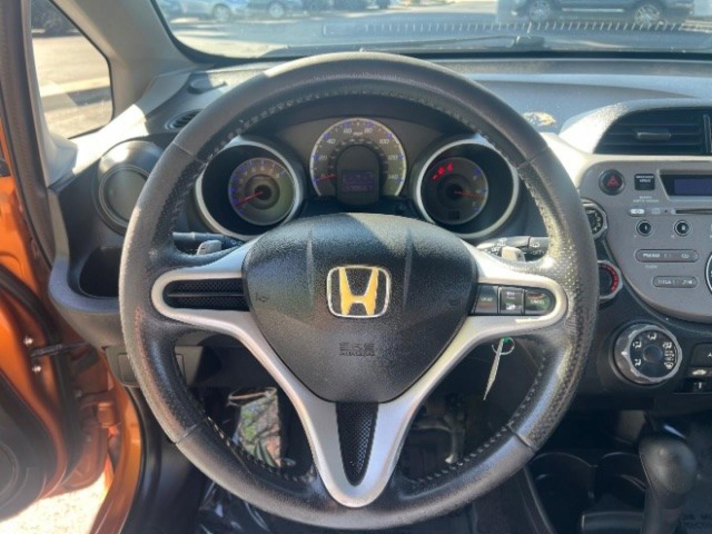 2009 Orange Revolution Metallic /Black Cloth Interior Honda Fit Sport 5-Speed AT (JHMGE88409S) with an 1.5L L4 SOHC 16V engine, 5-Speed Automatic transmission, located at 1865 East Red Hills Pkwy, St. George, 84770, (435) 628-0023, 37.120850, -113.543640 - We specialize in helping ALL people get the best financing available. No matter your credit score, good, bad or none we can get you an amazing rate. Had a bankruptcy, divorce, or repossessions? We give you the green light to get your credit back on the road. Low down and affordable payments that fit- Photo#15