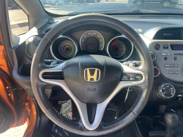 2009 Orange Revolution Metallic /Black Cloth Interior Honda Fit Sport 5-Speed AT (JHMGE88409S) with an 1.5L L4 SOHC 16V engine, 5-Speed Automatic transmission, located at 1865 East Red Hills Pkwy, St. George, 84770, (435) 628-0023, 37.120850, -113.543640 - We specialize in helping ALL people get the best financing available. No matter your credit score, good, bad or none we can get you an amazing rate. Had a bankruptcy, divorce, or repossessions? We give you the green light to get your credit back on the road. Low down and affordable payments that fit- Photo#15