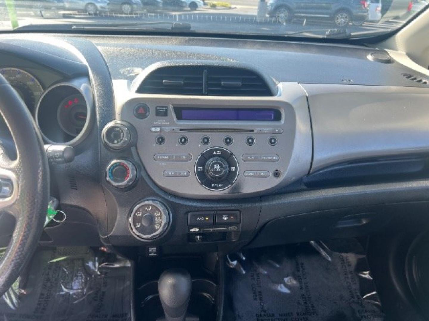2009 Orange Revolution Metallic /Black Cloth Interior Honda Fit Sport 5-Speed AT (JHMGE88409S) with an 1.5L L4 SOHC 16V engine, 5-Speed Automatic transmission, located at 1865 East Red Hills Pkwy, St. George, 84770, (435) 628-0023, 37.120850, -113.543640 - We specialize in helping ALL people get the best financing available. No matter your credit score, good, bad or none we can get you an amazing rate. Had a bankruptcy, divorce, or repossessions? We give you the green light to get your credit back on the road. Low down and affordable payments that fit- Photo#17