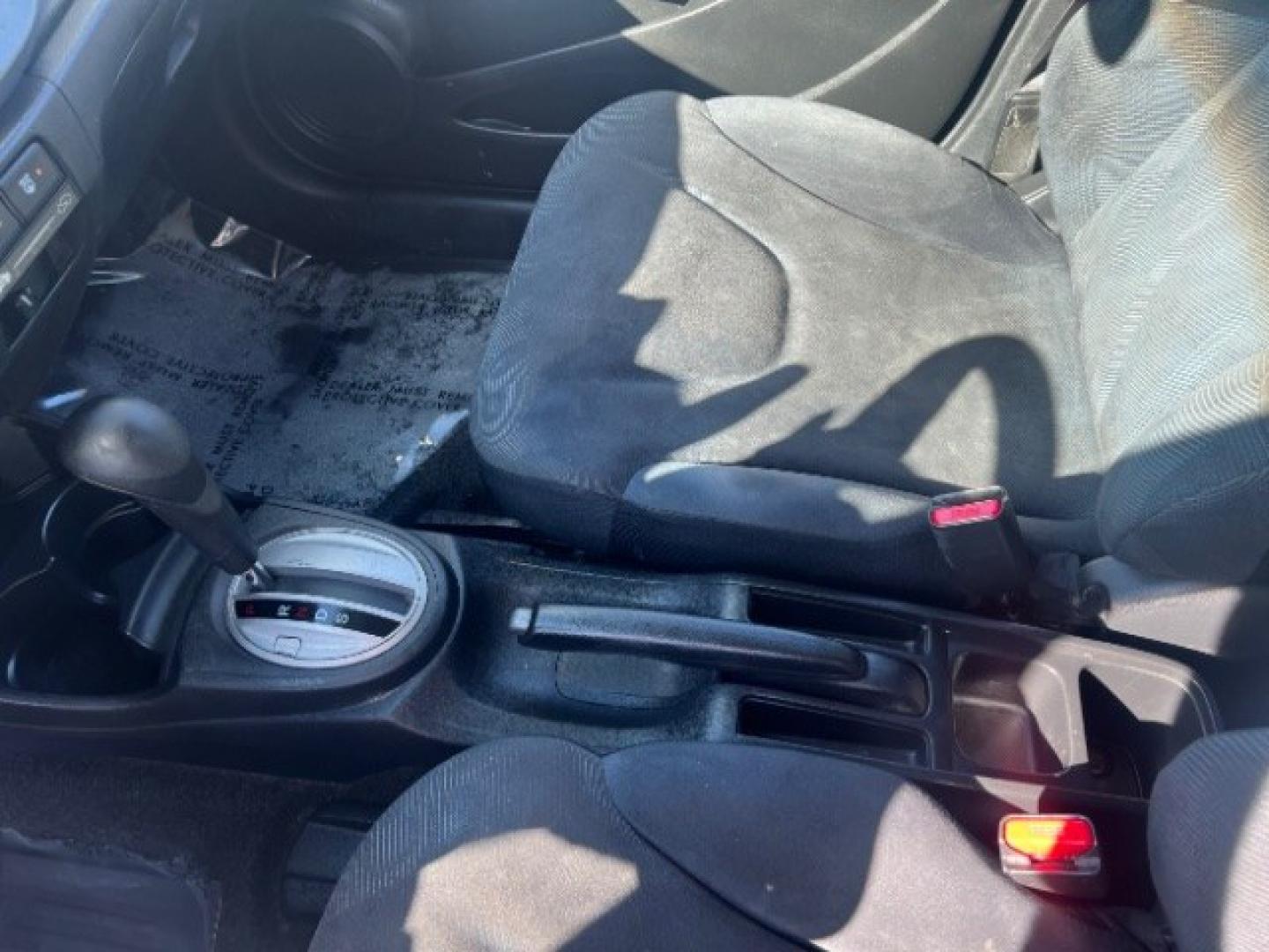 2009 Orange Revolution Metallic /Black Cloth Interior Honda Fit Sport 5-Speed AT (JHMGE88409S) with an 1.5L L4 SOHC 16V engine, 5-Speed Automatic transmission, located at 1865 East Red Hills Pkwy, St. George, 84770, (435) 628-0023, 37.120850, -113.543640 - We specialize in helping ALL people get the best financing available. No matter your credit score, good, bad or none we can get you an amazing rate. Had a bankruptcy, divorce, or repossessions? We give you the green light to get your credit back on the road. Low down and affordable payments that fit- Photo#18