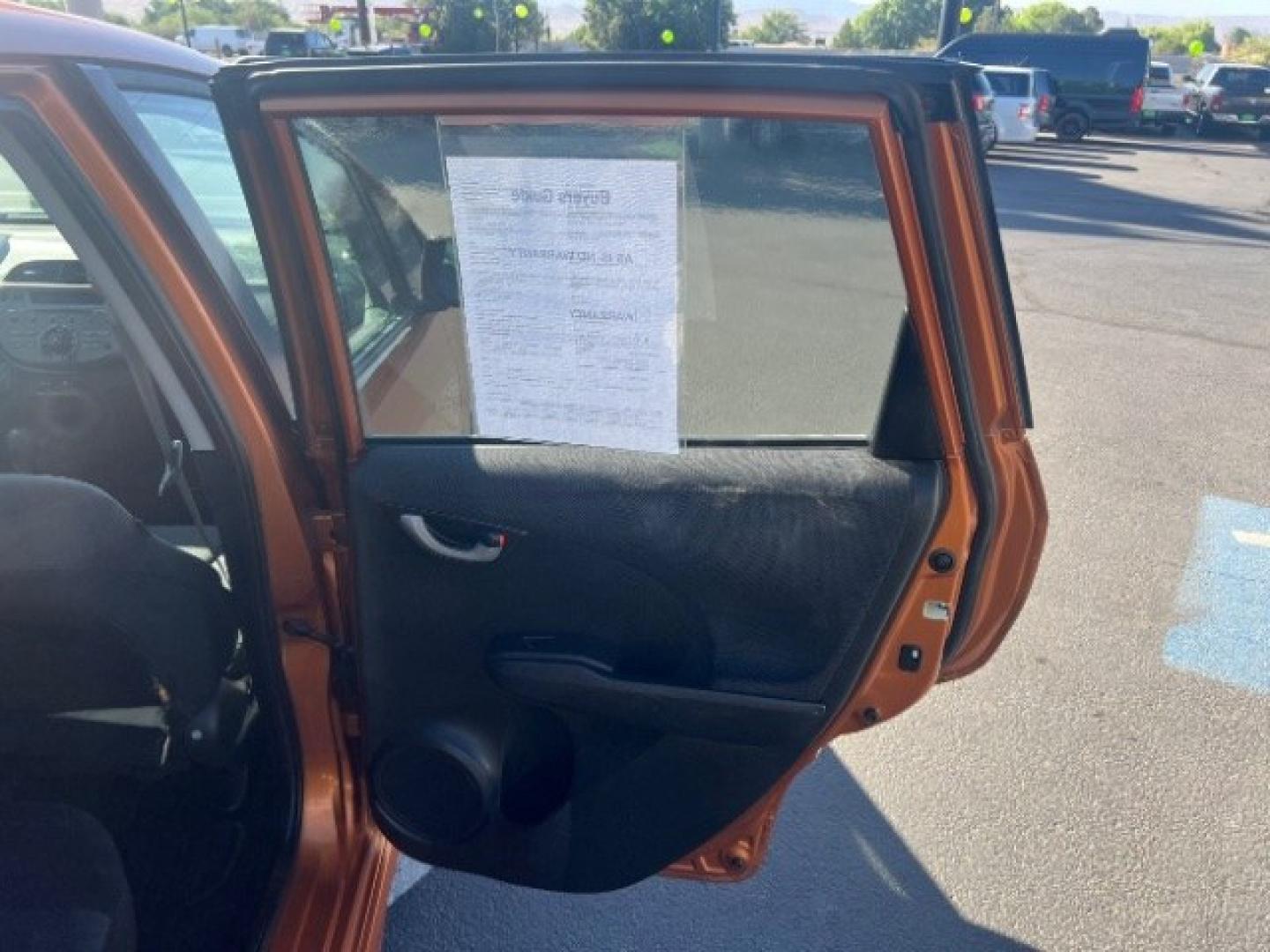 2009 Orange Revolution Metallic /Black Cloth Interior Honda Fit Sport 5-Speed AT (JHMGE88409S) with an 1.5L L4 SOHC 16V engine, 5-Speed Automatic transmission, located at 1865 East Red Hills Pkwy, St. George, 84770, (435) 628-0023, 37.120850, -113.543640 - We specialize in helping ALL people get the best financing available. No matter your credit score, good, bad or none we can get you an amazing rate. Had a bankruptcy, divorce, or repossessions? We give you the green light to get your credit back on the road. Low down and affordable payments that fit- Photo#23