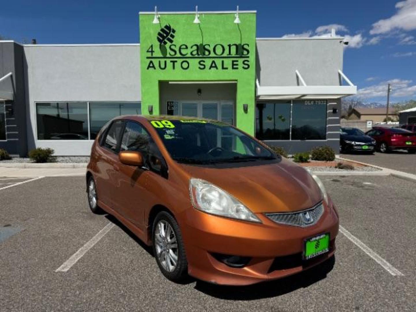 2009 Orange Revolution Me /Black Cloth Interior Honda Fit Sport 5-Speed AT (JHMGE88409S) with an 1.5L L4 SOHC 16V engine, 5-Speed Automatic transmission, located at 1865 East Red Hills Pkwy, St. George, 84770, (435) 628-0023, 37.120850, -113.543640 - We specialize in helping ALL people get the best financing available. No matter your credit score, good, bad or none we can get you an amazing rate. Had a bankruptcy, divorce, or repossessions? We give you the green light to get your credit back on the road. Low down and affordable payments that fit - Photo#0