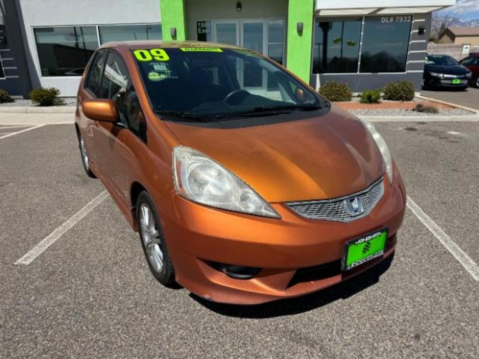 2009 Orange Revolution Metallic /Black Cloth Interior Honda Fit Sport 5-Speed AT (JHMGE88409S) with an 1.5L L4 SOHC 16V engine, 5-Speed Automatic transmission, located at 1865 East Red Hills Pkwy, St. George, 84770, (435) 628-0023, 37.120850, -113.543640 - We specialize in helping ALL people get the best financing available. No matter your credit score, good, bad or none we can get you an amazing rate. Had a bankruptcy, divorce, or repossessions? We give you the green light to get your credit back on the road. Low down and affordable payments that fit - Photo #2