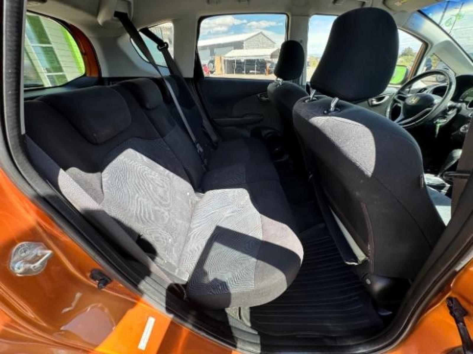 2009 Orange Revolution Metallic /Black Cloth Interior Honda Fit Sport 5-Speed AT (JHMGE88409S) with an 1.5L L4 SOHC 16V engine, 5-Speed Automatic transmission, located at 1865 East Red Hills Pkwy, St. George, 84770, (435) 628-0023, 37.120850, -113.543640 - We specialize in helping ALL people get the best financing available. No matter your credit score, good, bad or none we can get you an amazing rate. Had a bankruptcy, divorce, or repossessions? We give you the green light to get your credit back on the road. Low down and affordable payments that fit - Photo #29