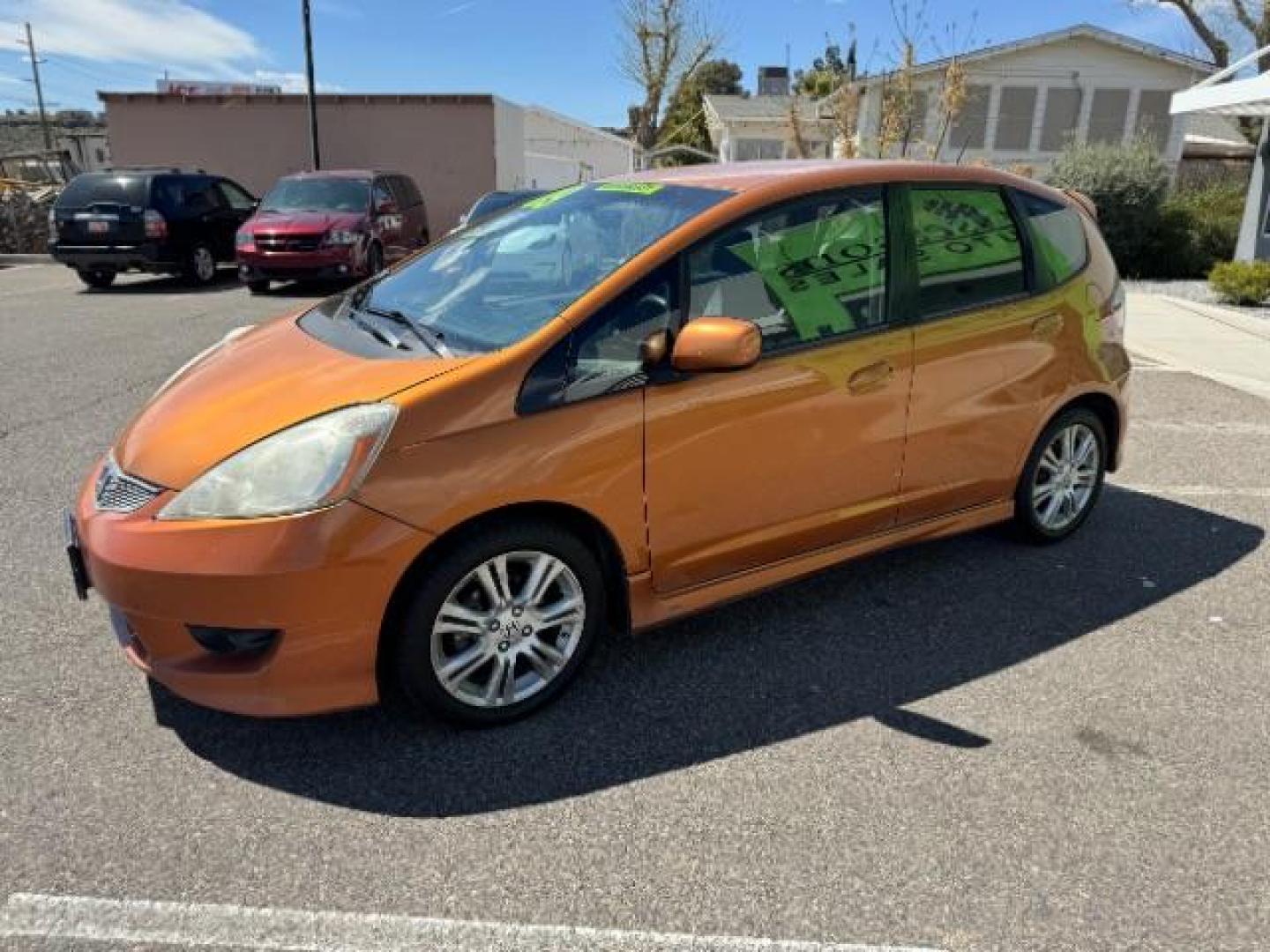 2009 Orange Revolution Me /Black Cloth Interior Honda Fit Sport 5-Speed AT (JHMGE88409S) with an 1.5L L4 SOHC 16V engine, 5-Speed Automatic transmission, located at 1865 East Red Hills Pkwy, St. George, 84770, (435) 628-0023, 37.120850, -113.543640 - We specialize in helping ALL people get the best financing available. No matter your credit score, good, bad or none we can get you an amazing rate. Had a bankruptcy, divorce, or repossessions? We give you the green light to get your credit back on the road. Low down and affordable payments that fit - Photo#4