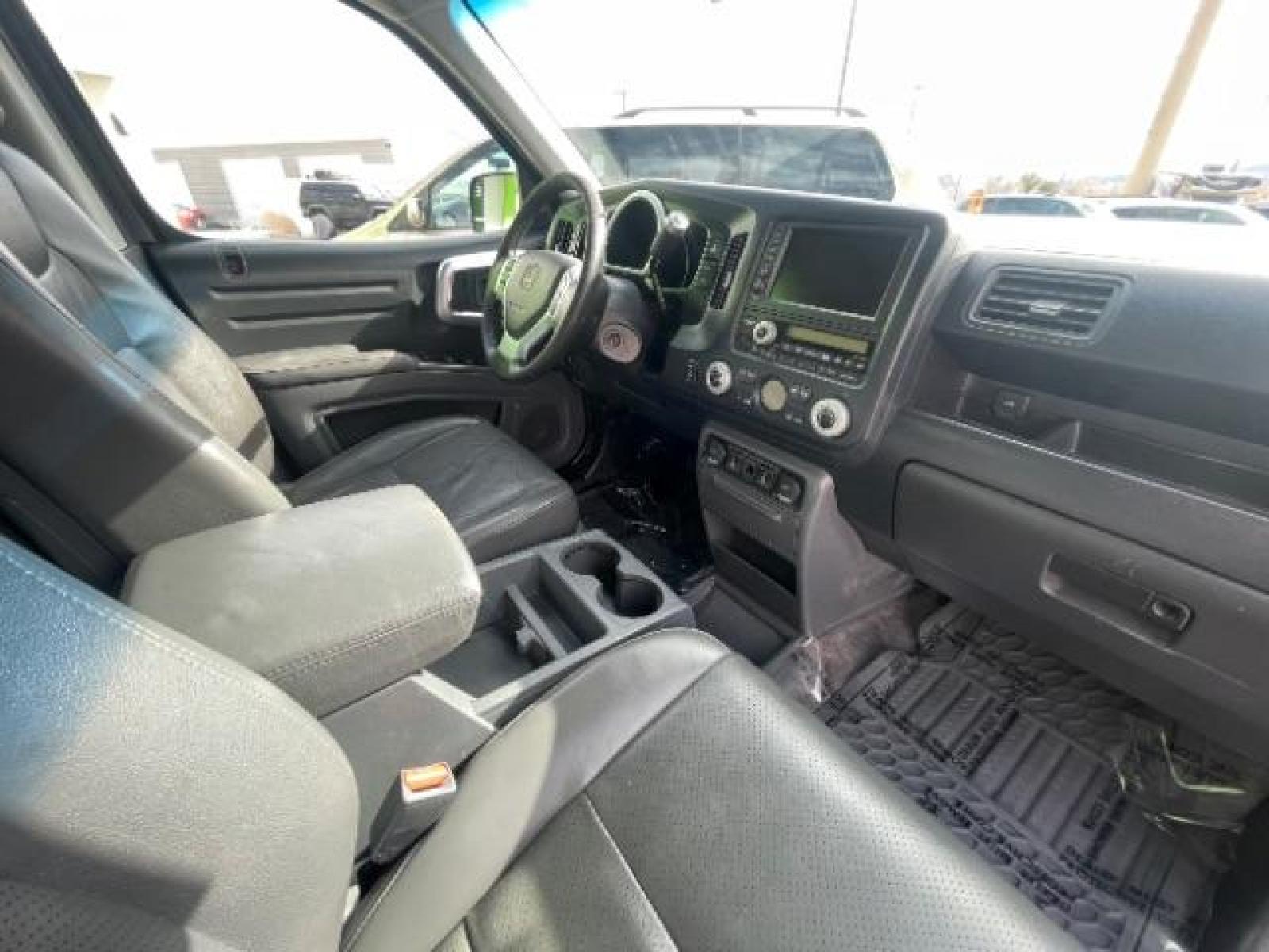 2008 Billet Silver Metallic /Gray Leather Interior Honda Ridgeline RTL (2HJYK16598H) with an 3.5L V6 SOHC 24V engine, 5-Speed Automatic transmission, located at 1865 East Red Hills Pkwy, St. George, 84770, (435) 628-0023, 37.120850, -113.543640 - Photo #31